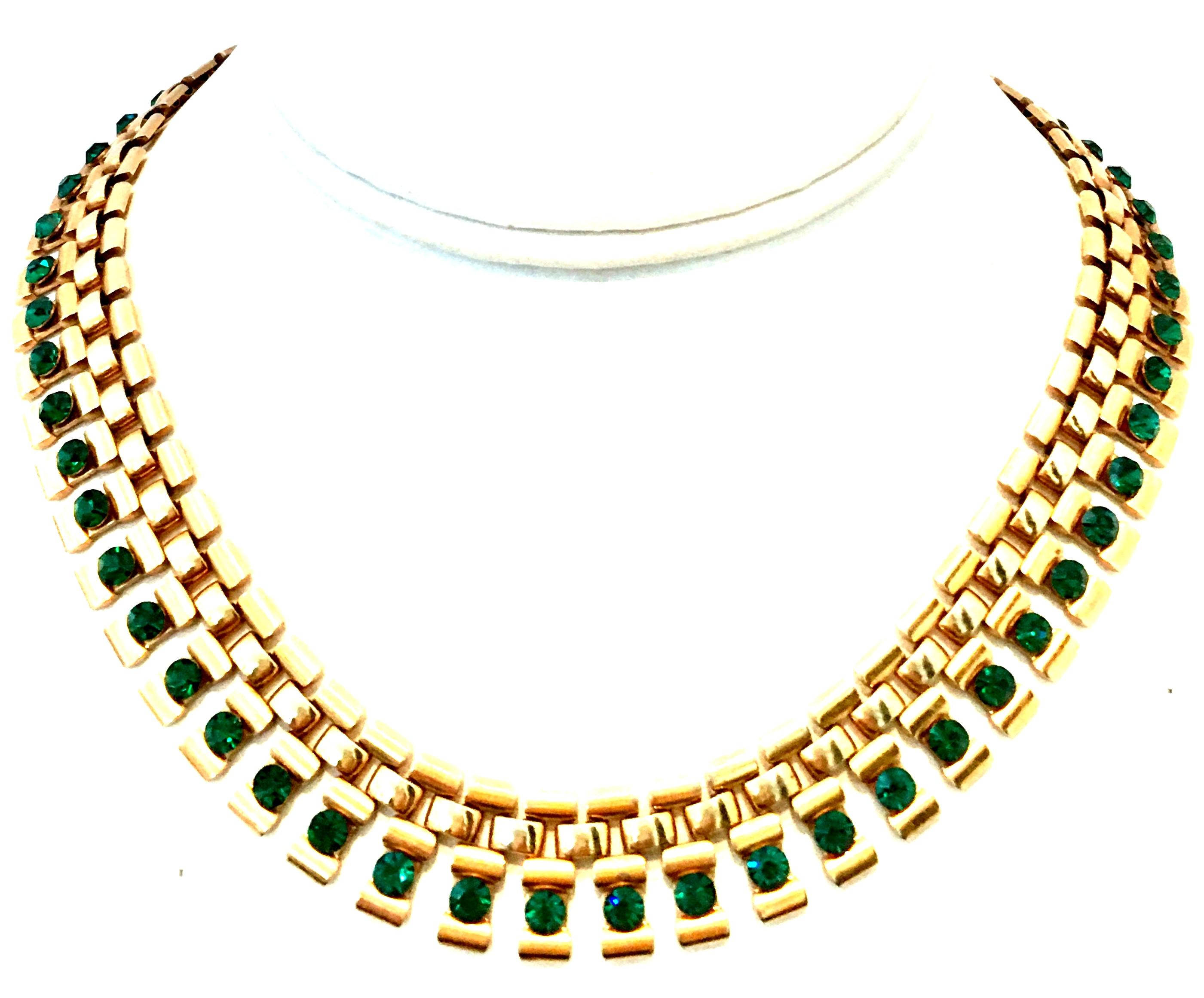 Mid-20th Century Gold Plate & Emerald Austrian Crystal Link Choker Style Necklace. This finely executed piece features gold plate link style choker length necklace with brilliant cut and faceted emerald green Austrian Crystals.