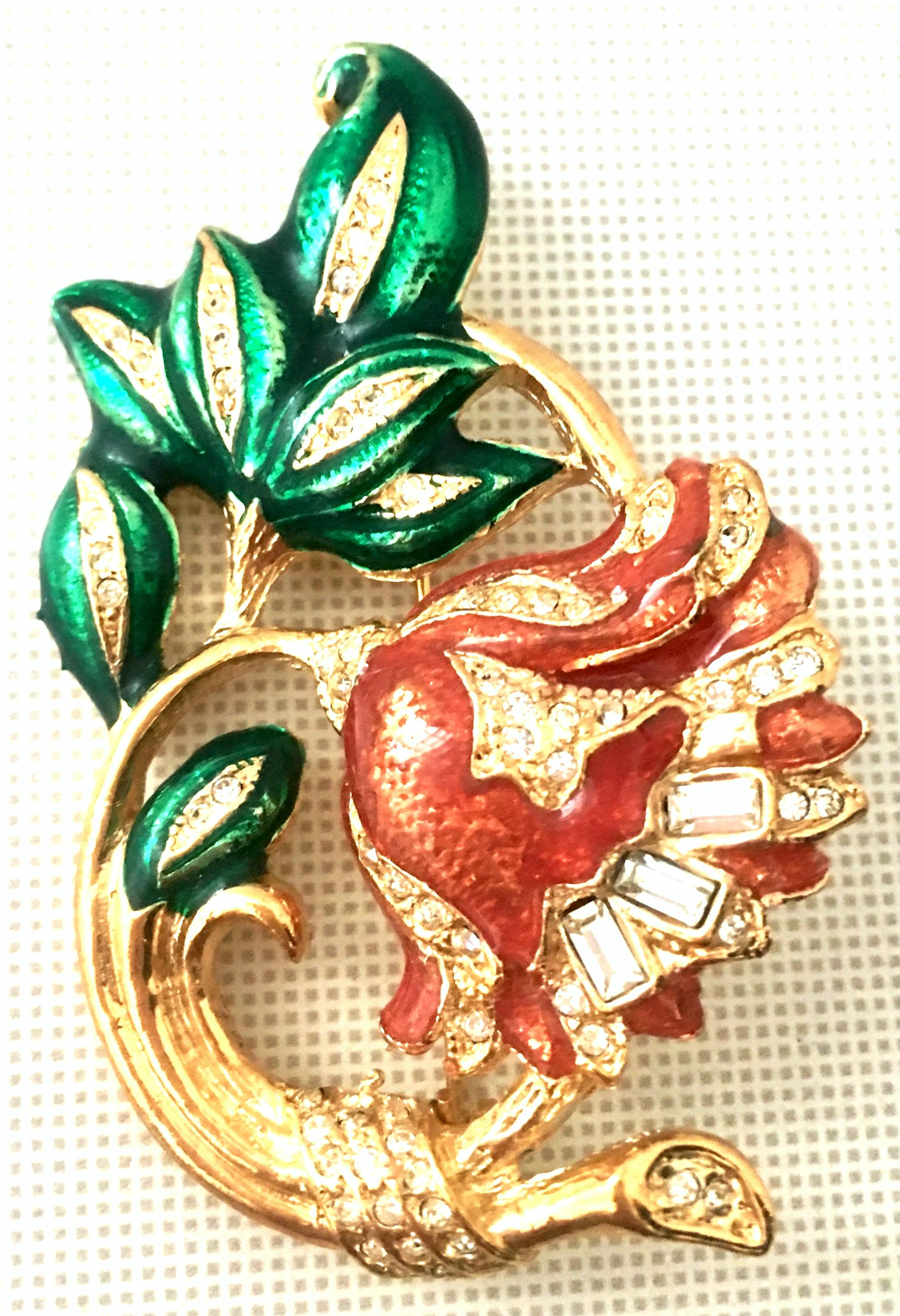 20th Century Gold Plate, Enamel & Austrian Crystal Dimensional French Horn And Fauna Christmas Brooch. This signed finely crafted piece features a dimensional French Horn motif with hand painted vivid green and coral enamel fauna with colorless