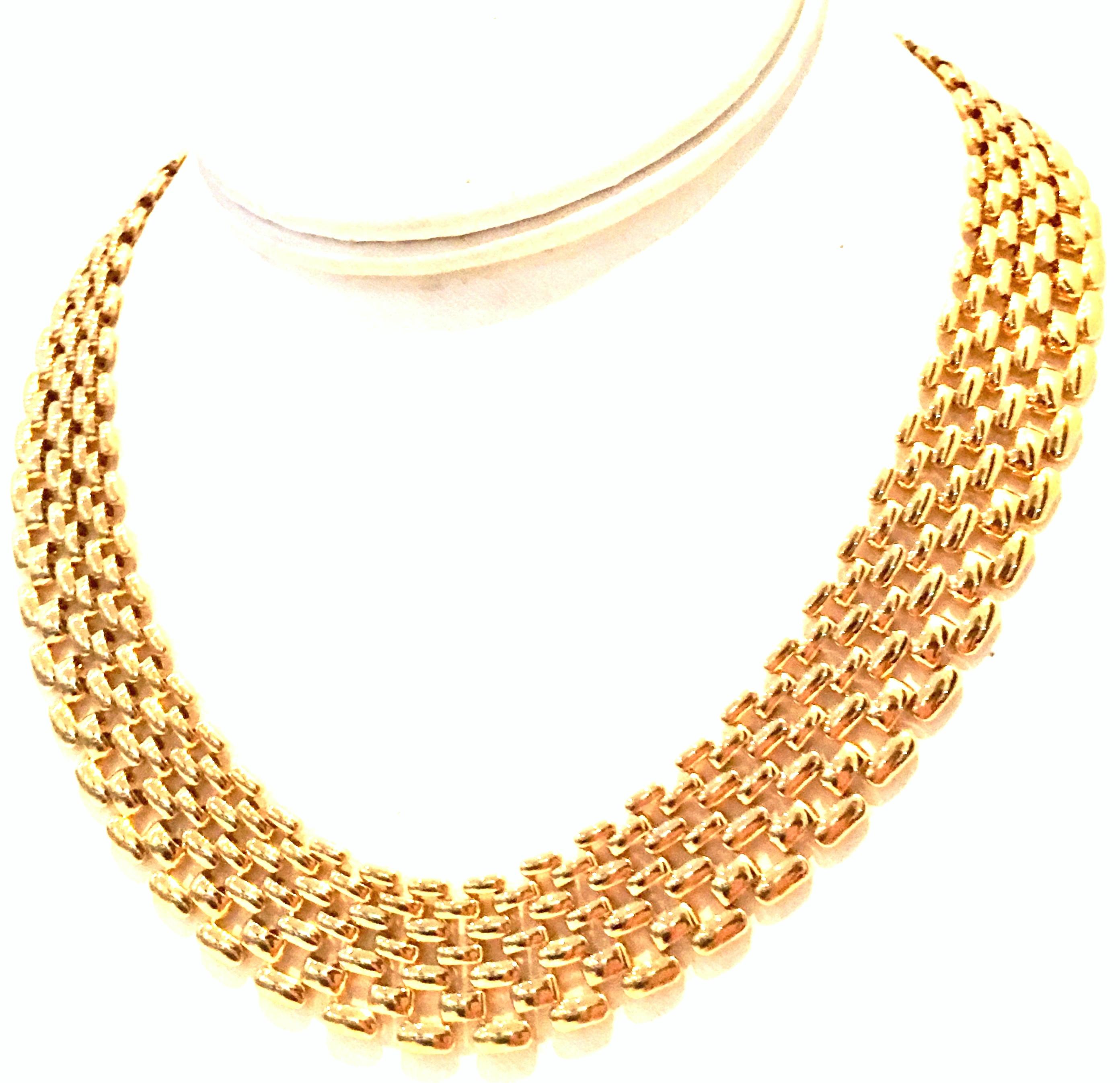 gold choker style necklace