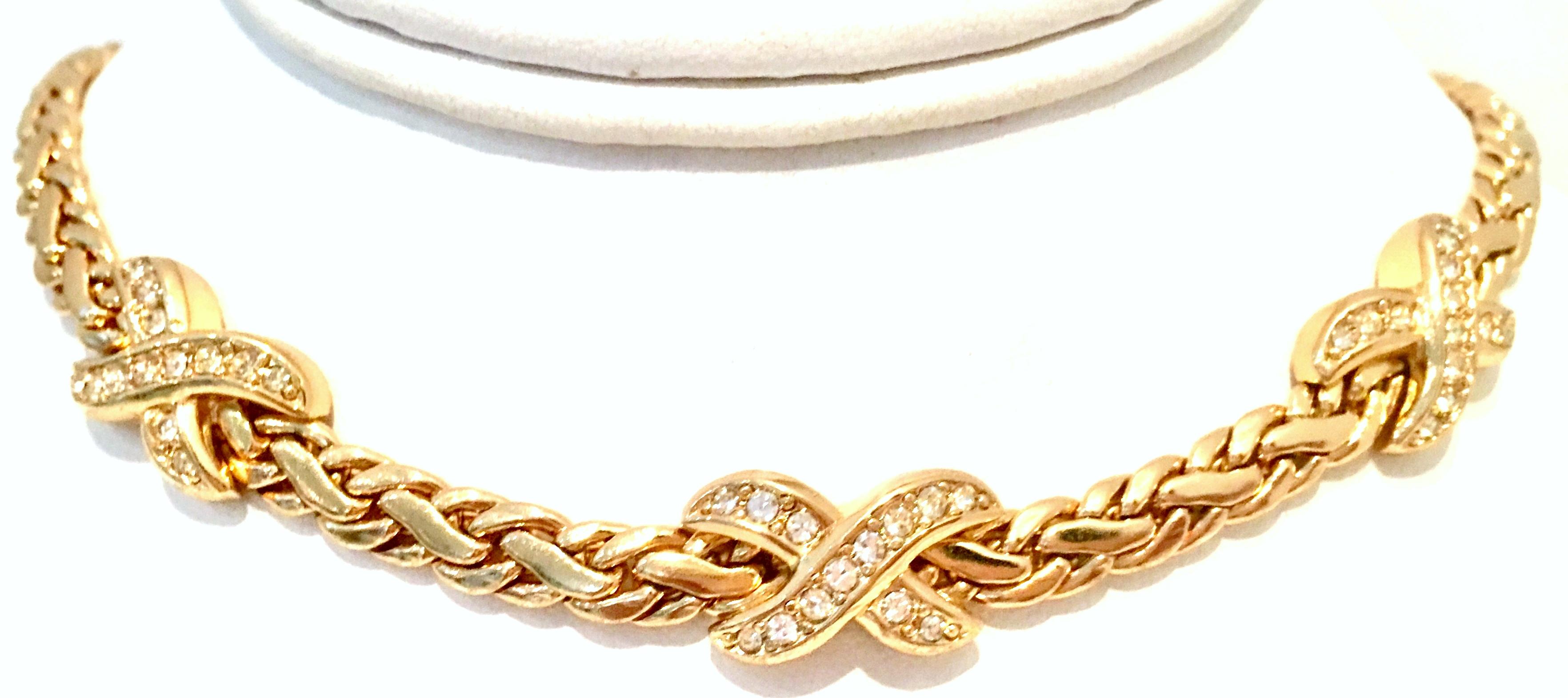20th Century Gold & Swaorovski Crystal Choker Style Necklace By, Christian Dior. This gold plate twisted rope style choker necklace features three dimensional twist 