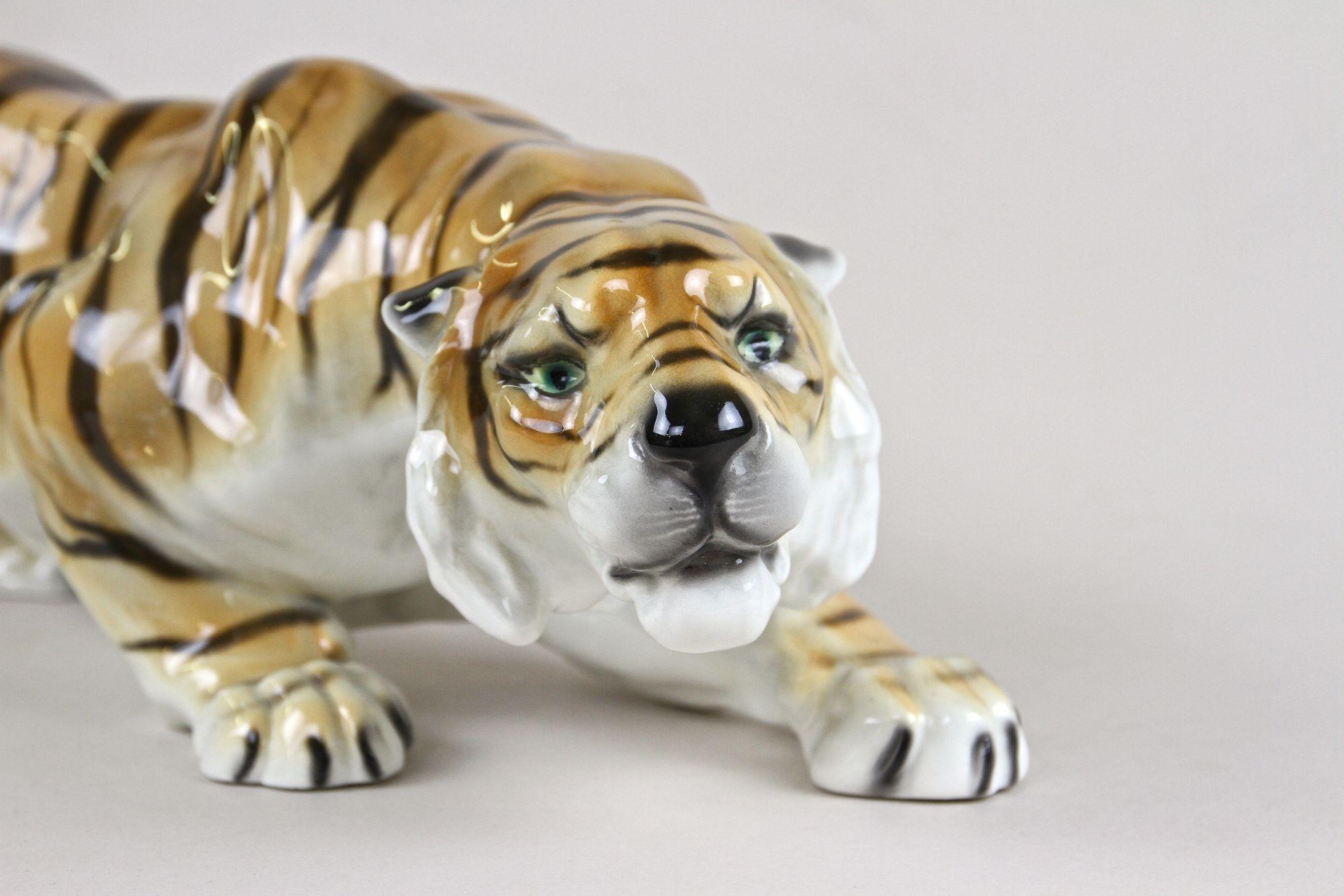 Very decorative ceramic tiger figurine made around 1920 by the renowned company of Friedrich Goldscheider in Vienna - Austria. The manufactory of Goldscheider, one of the most successful companies in european ceramic history, was founded 1885 and is