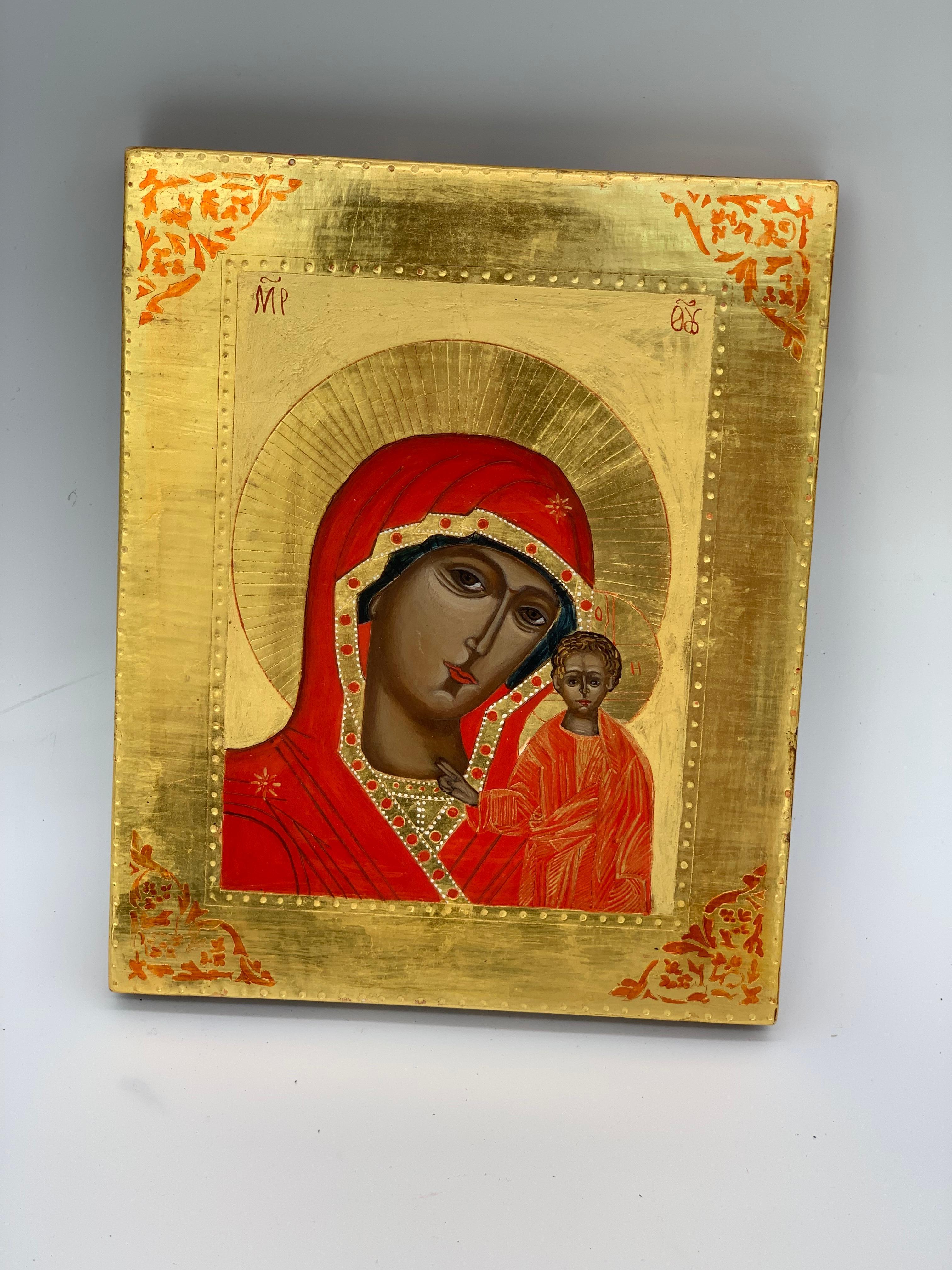 Beautiful Greek icon of Mary mother of god with Jesus next to her. Gold leaf and red details make this a beautiful icon.