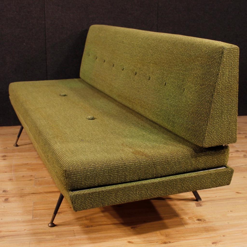Italian design sofa from the 1950s-1960s. Furniture in style of Zanuso from particular line and construction. Chaise longue covered in green fabric with different marks and spots. Furniture with structure in good condition equipped with a particular