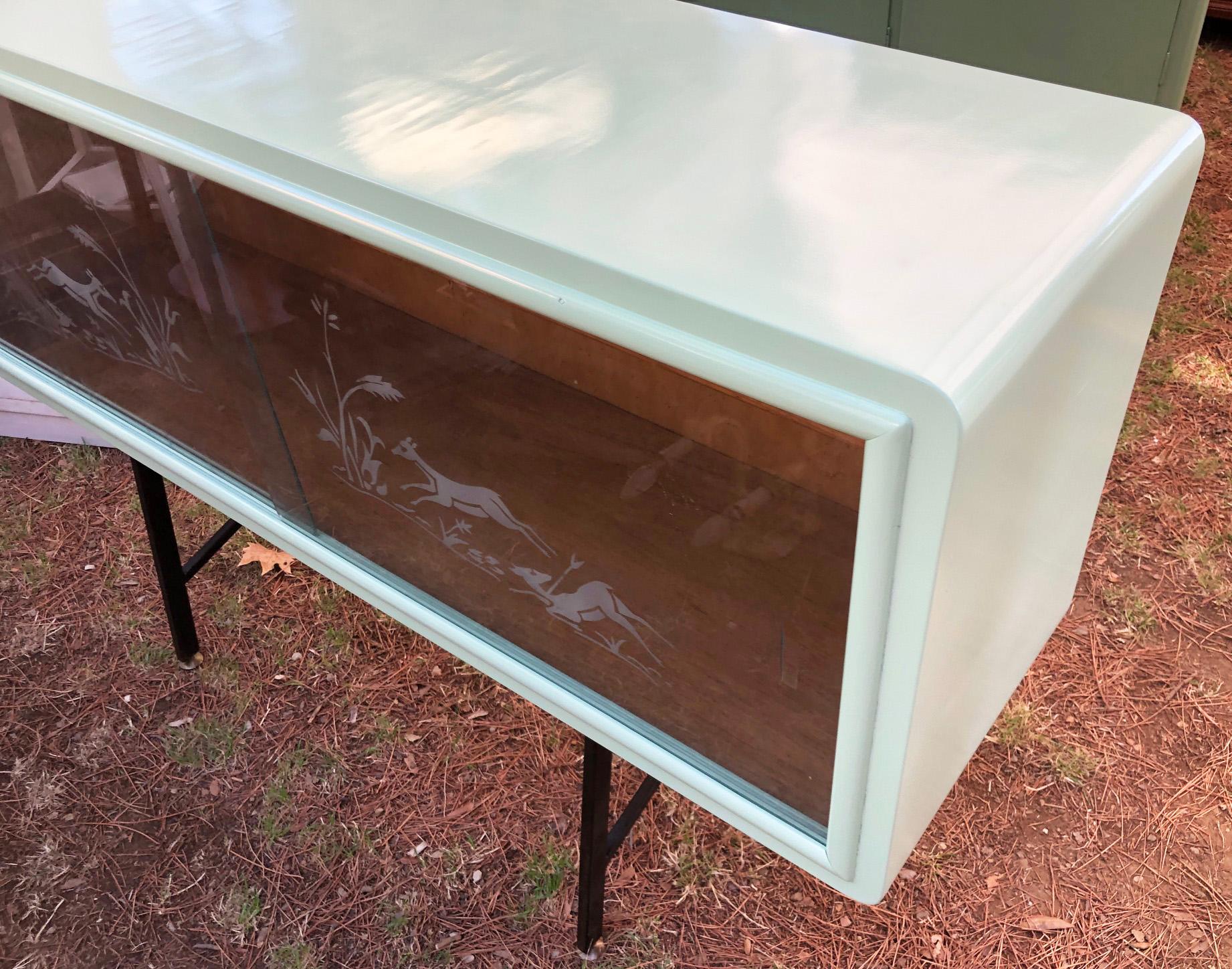 Art Deco 20th century green Italian sideboard, with sliding glass For Sale