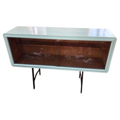 Retro 20th century green Italian sideboard, with sliding glass