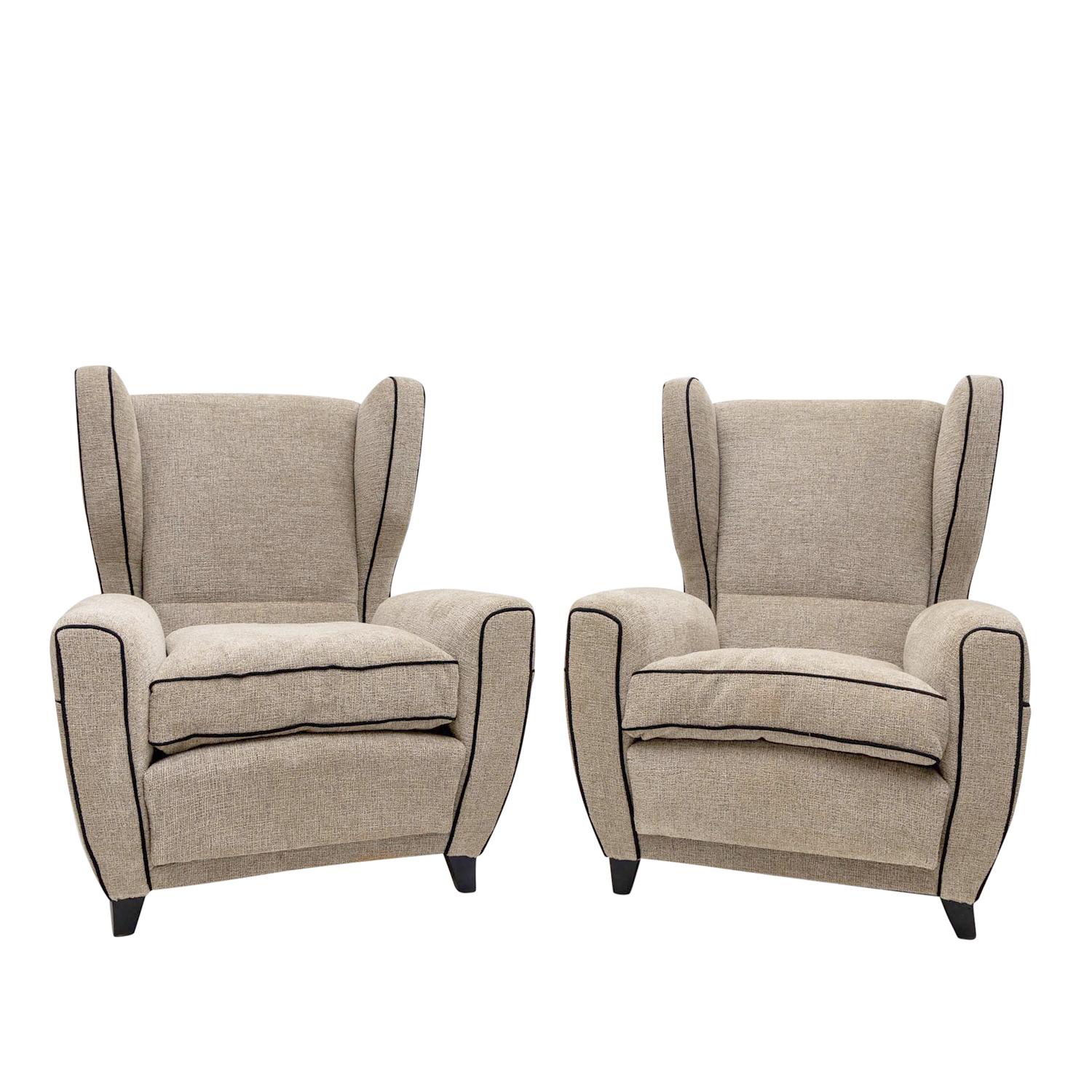 A vintage Mid-Century modern Italian pair of tall lounge chairs designed by Melchiorre Bega in good condition. The sculptural wingback chairs have a slightly inclined backrest detailed with earmuffs, headrests particularized by arched armrests,