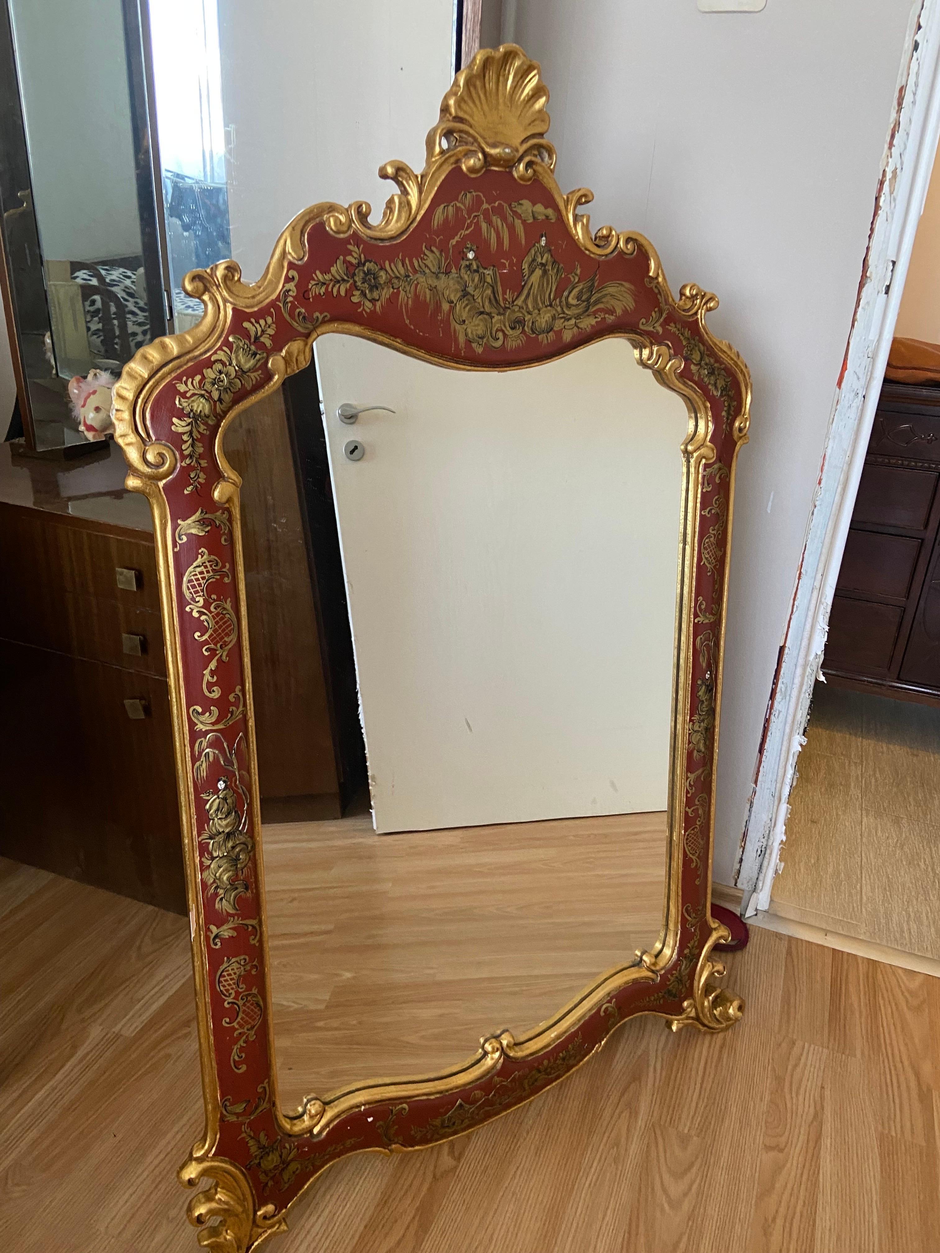 Hand carved gilt wood hand painted wall mirror made in Louis XV style.