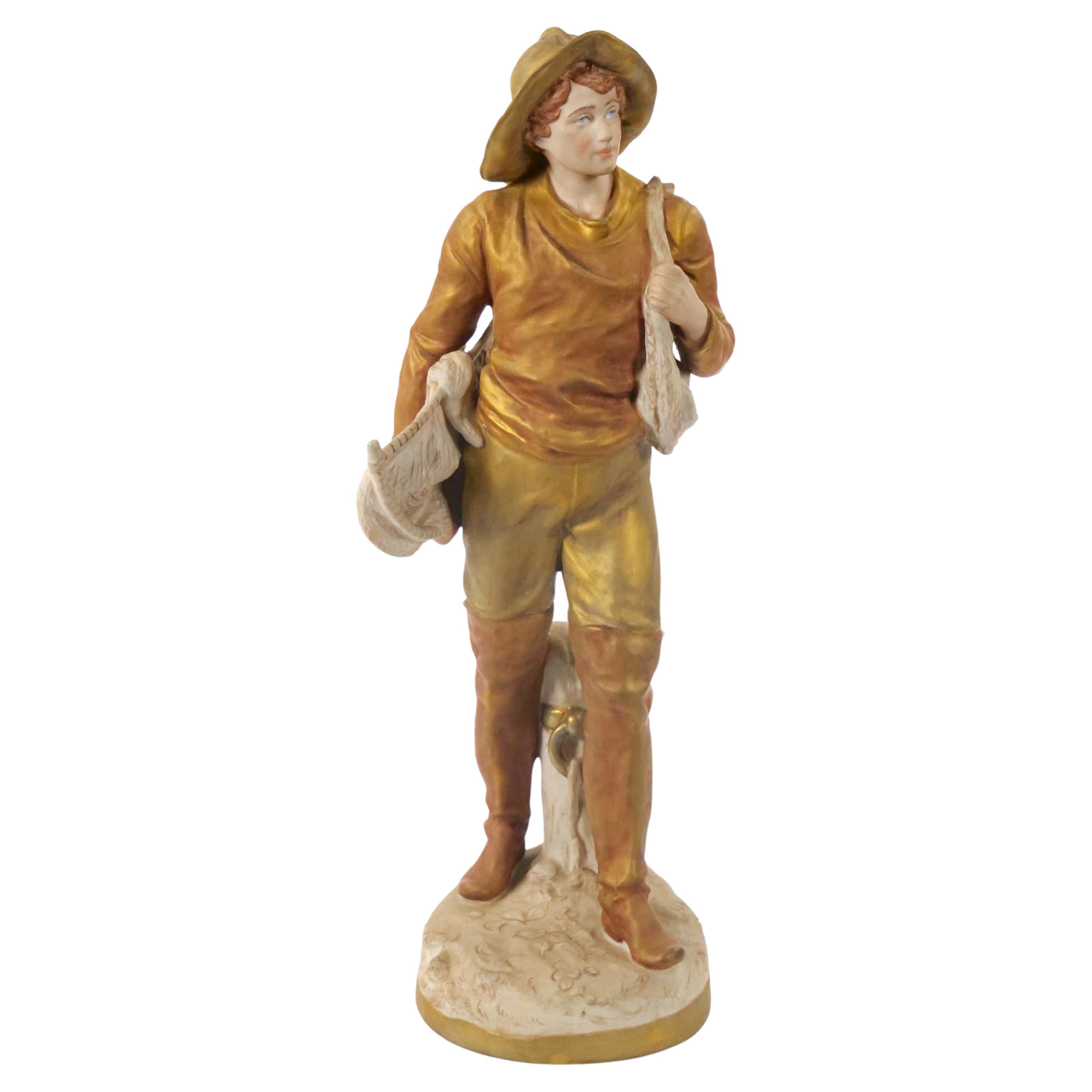 Escultura masculina decorativa de porcelana pintada a mano/dorada del siglo XX