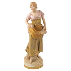 Escultura femenina decorativa de porcelana pintada a mano/dorada del siglo XX