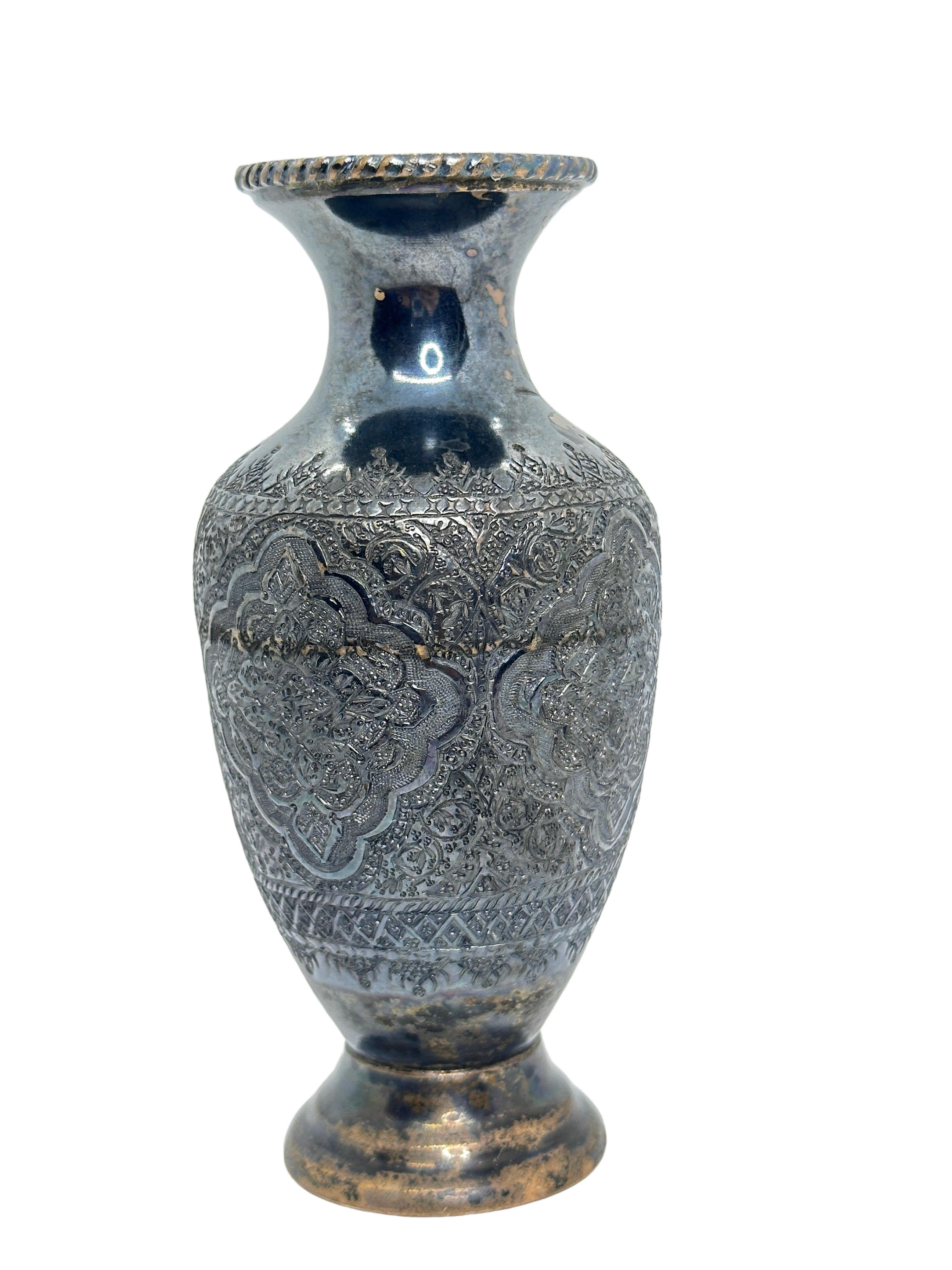 Gorgeous vintage handmade silver Vase. Sorry we don't know anything about it, but its beautiful. It is marked with a sign of the silversmith. I am unsure of the age of this object and would suggest it is a vintage item from the 20th century, due to