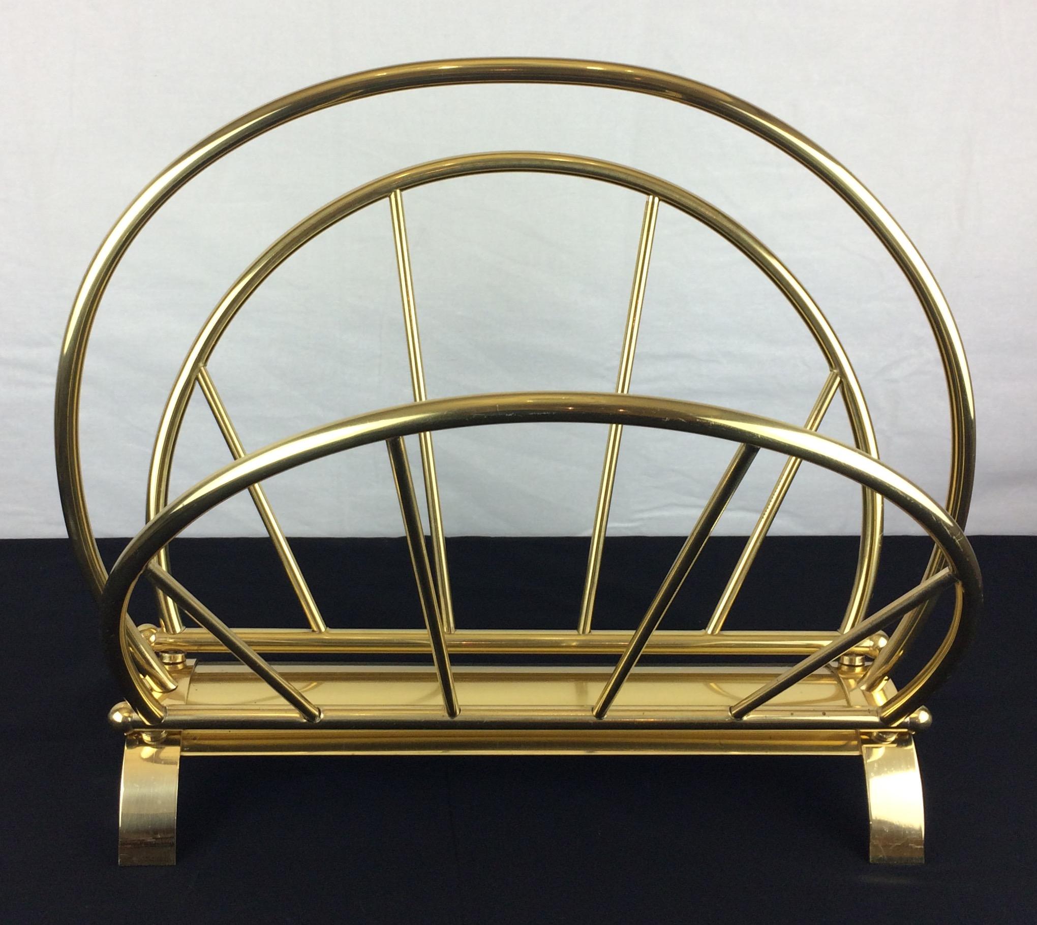 This vintage French magazine or newspaper rack was produced in the 1970s-1980s and is made of solid brass.

Very good condition — This item has no defects, but it may show slight traces of use. Patina consistent with age and use.

Materials: