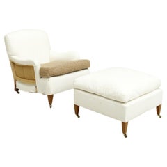 20th Century Howard style armchair and footstool
