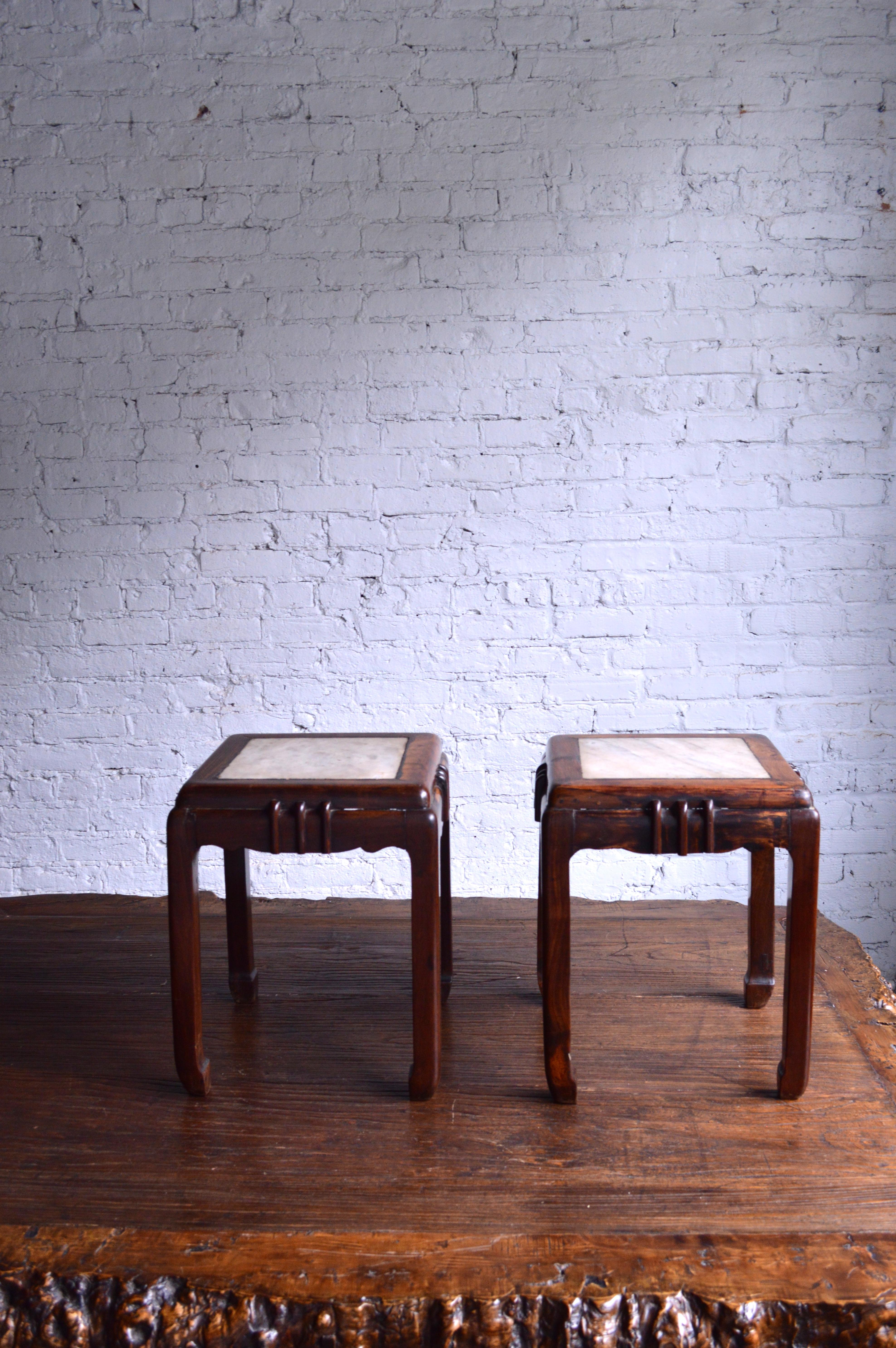 20th century Huali and marble stools. These are Chinese Art Deco, from Shanghai in the 1920s. Their original use would have been as stools around a games table.

Huali is a Chinese rosewood.