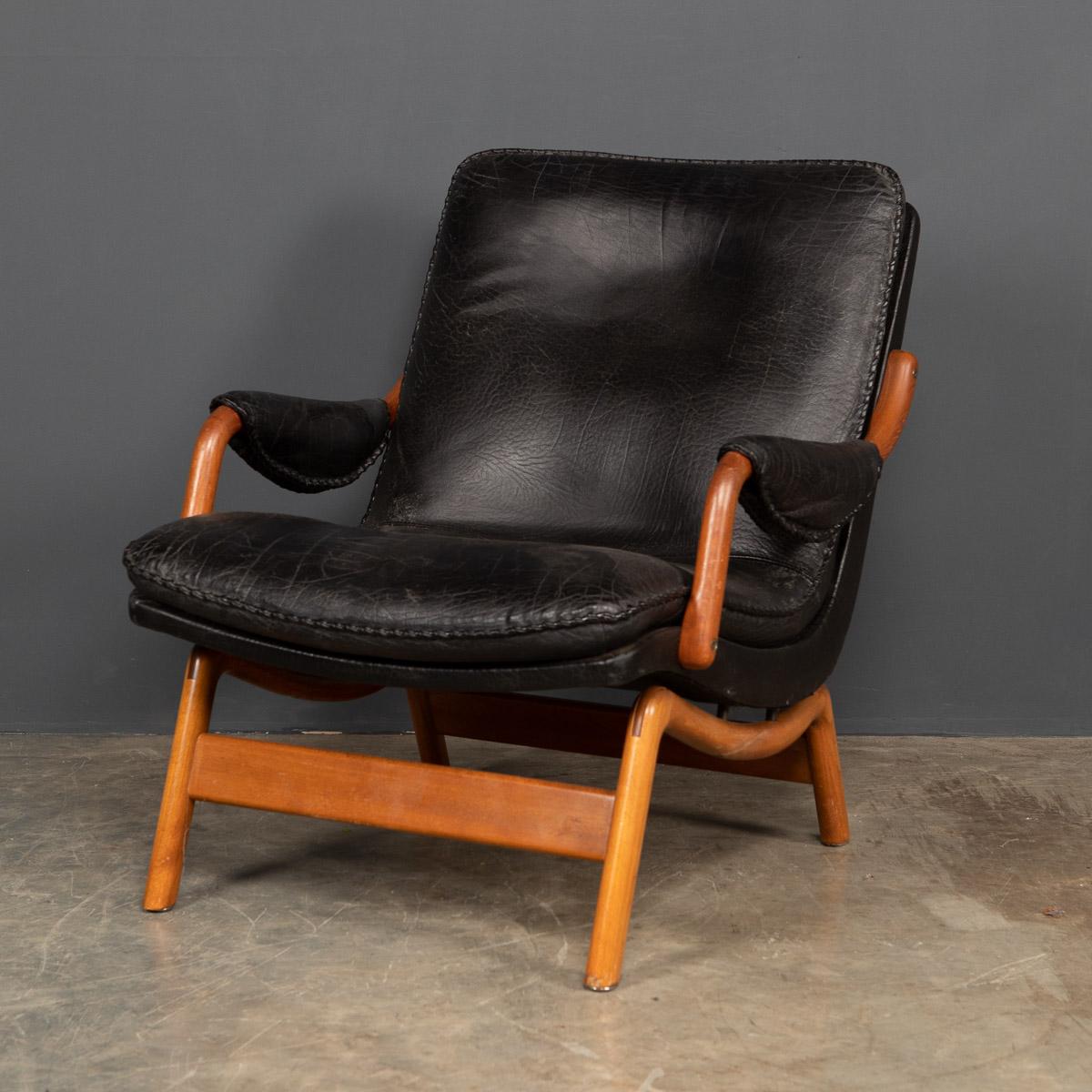 Very stylish chair, made by Ikea from the 1960's. This very comfortable chair has a teak frame and black leather seating with a good patination and a hand-stitch detail to the cushion.

Measures: Height: 84cm
Depth: 90cm
Width: 86m.