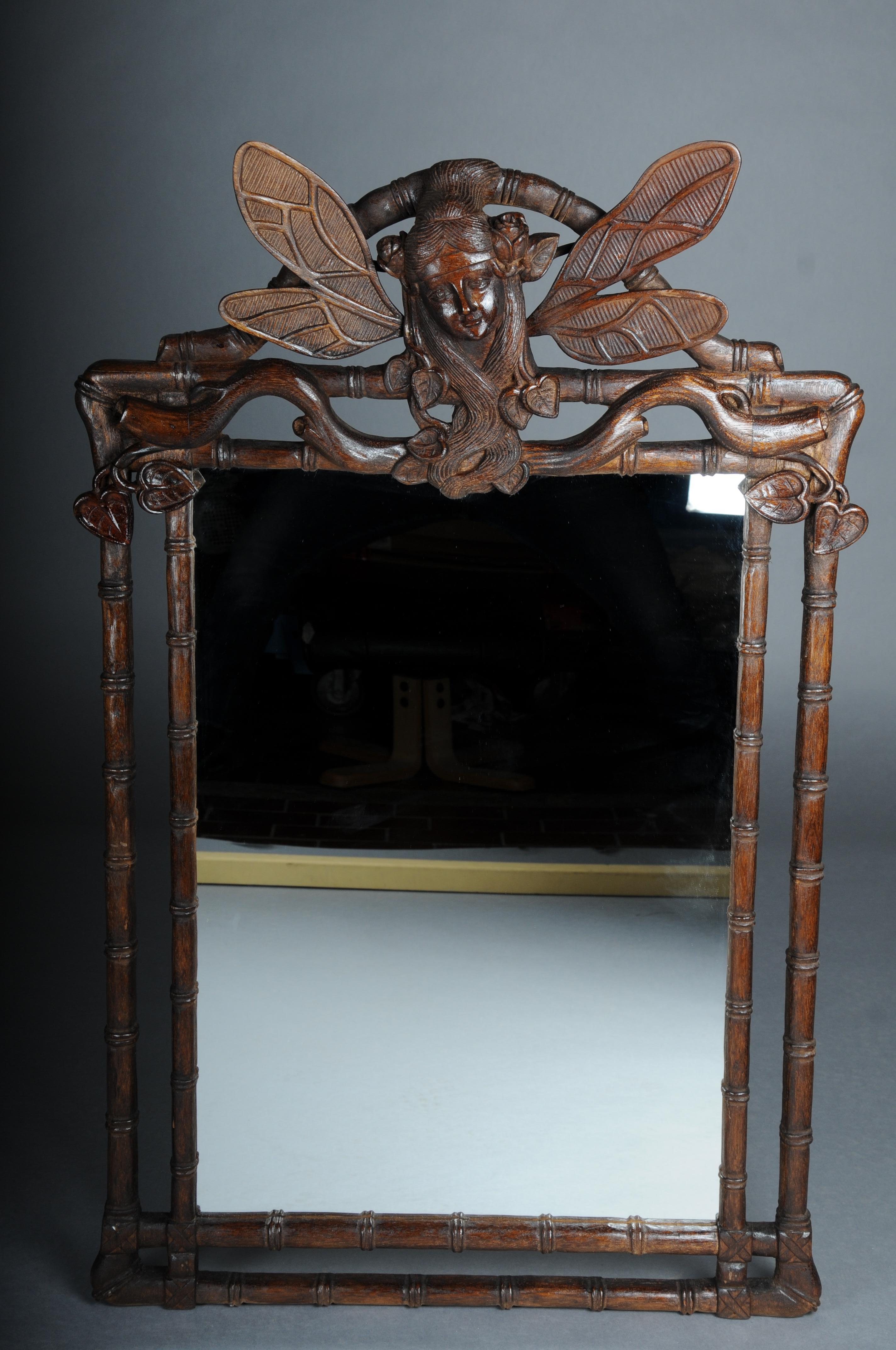 20th Century Impressive French Art Noveau Wall Mirror


Solid wood, finely carved and dark stained.
Branch-shaped frame. Mirror crowned with a winged fairy face.

Very decorative and elegant. A real eye-catcher in every home.