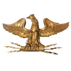 20th Century Impressive Giltwood Eagle Holding Metal Arrows