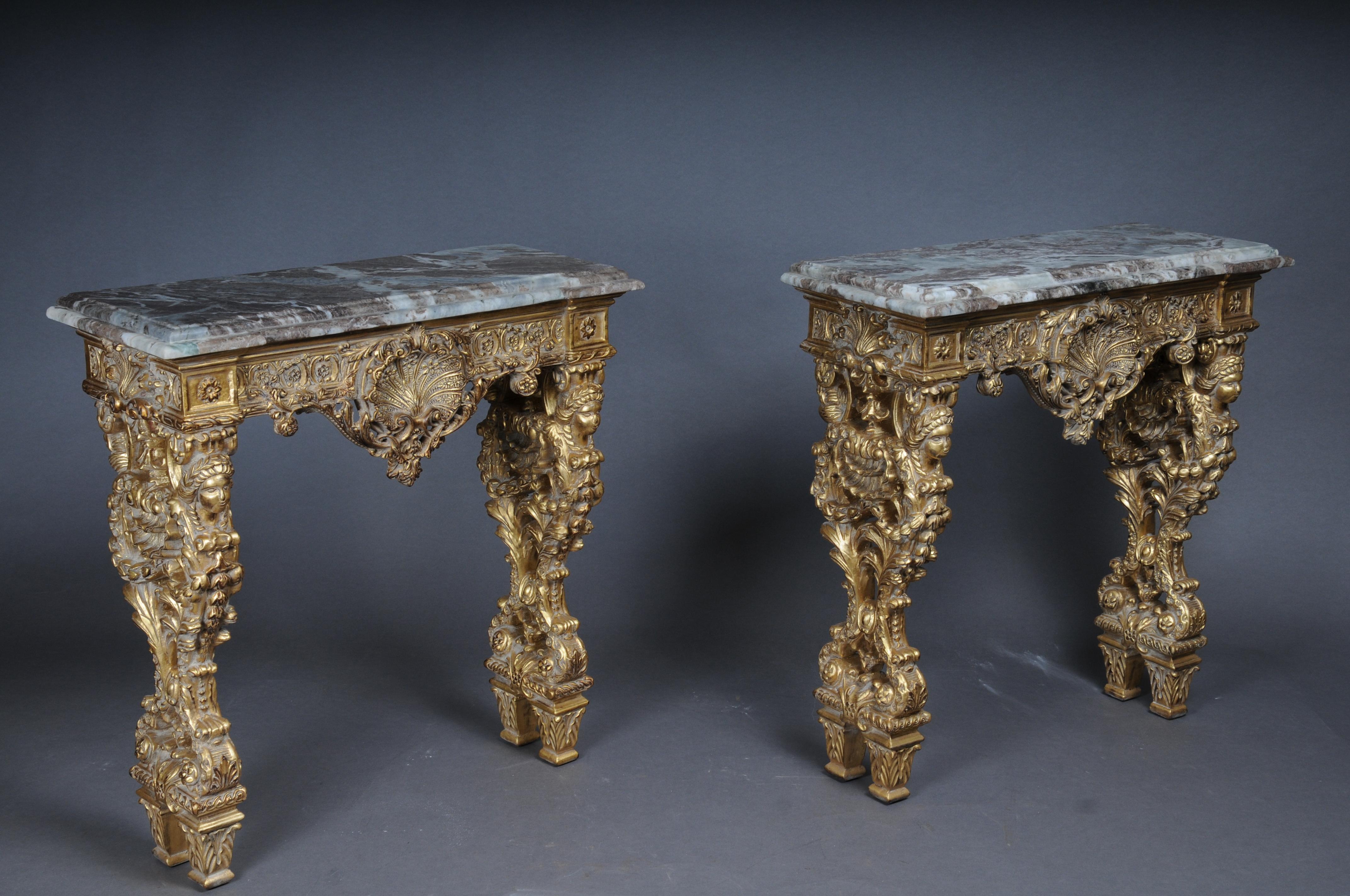 20th Century Impressive wall console gilded with marble, model after F. Linke #2


Solid beech wood, hand-carved and gilded. Extremely finely carved ornaments. Pronounced frame crowned with shell ornament. Straight legs which are also richly