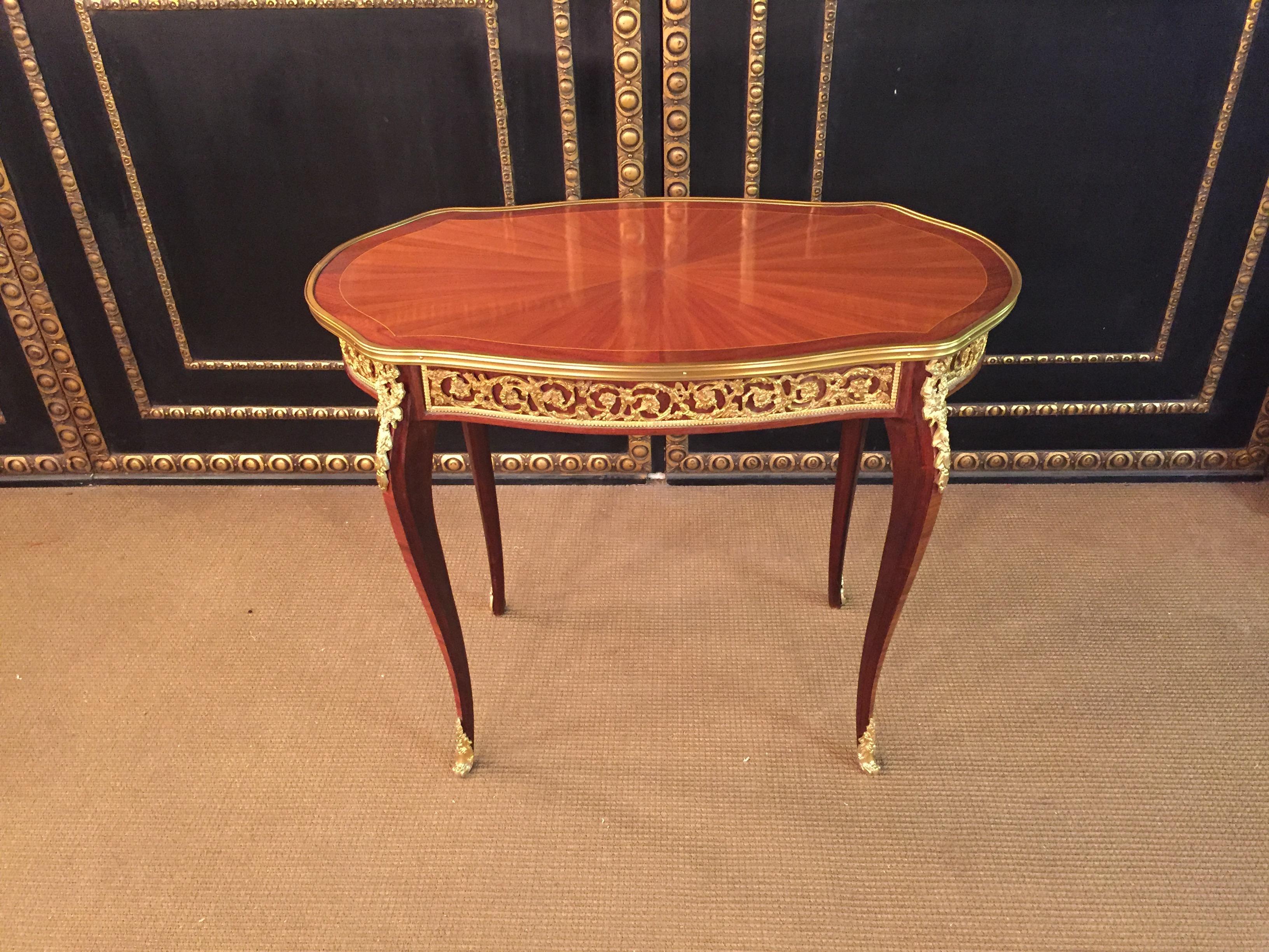 Exclusive French Salon side table in transition style. Rosewood and rosewood on solid beech, slightly convex and concave, carcass, flanked by solid corner straps on high, elegantly curved legs ending in sabots. Of precious woods inlaid with