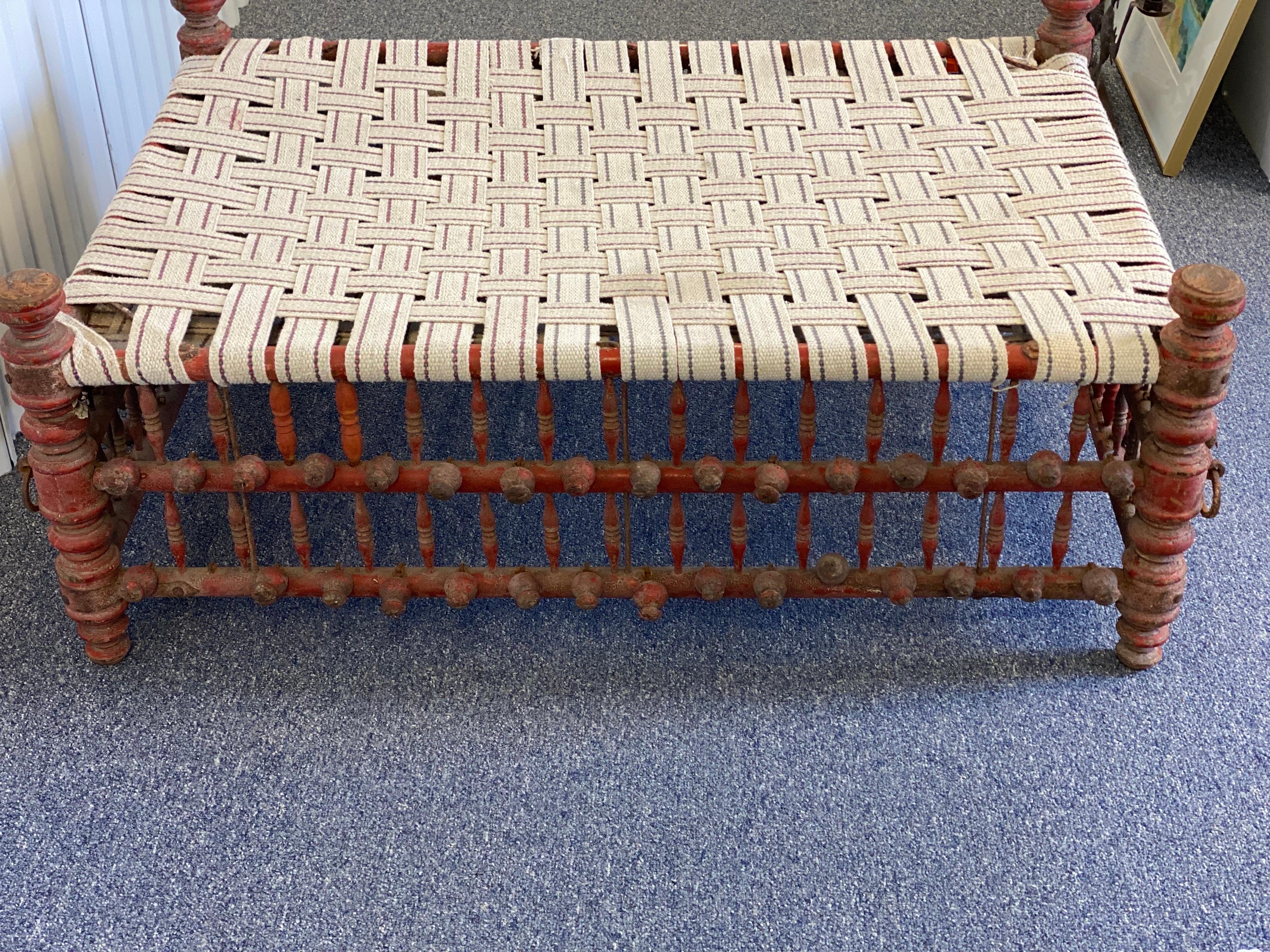 20th Century Indian Red Painted Wooden Ball & Stick Ottoman For Sale 3