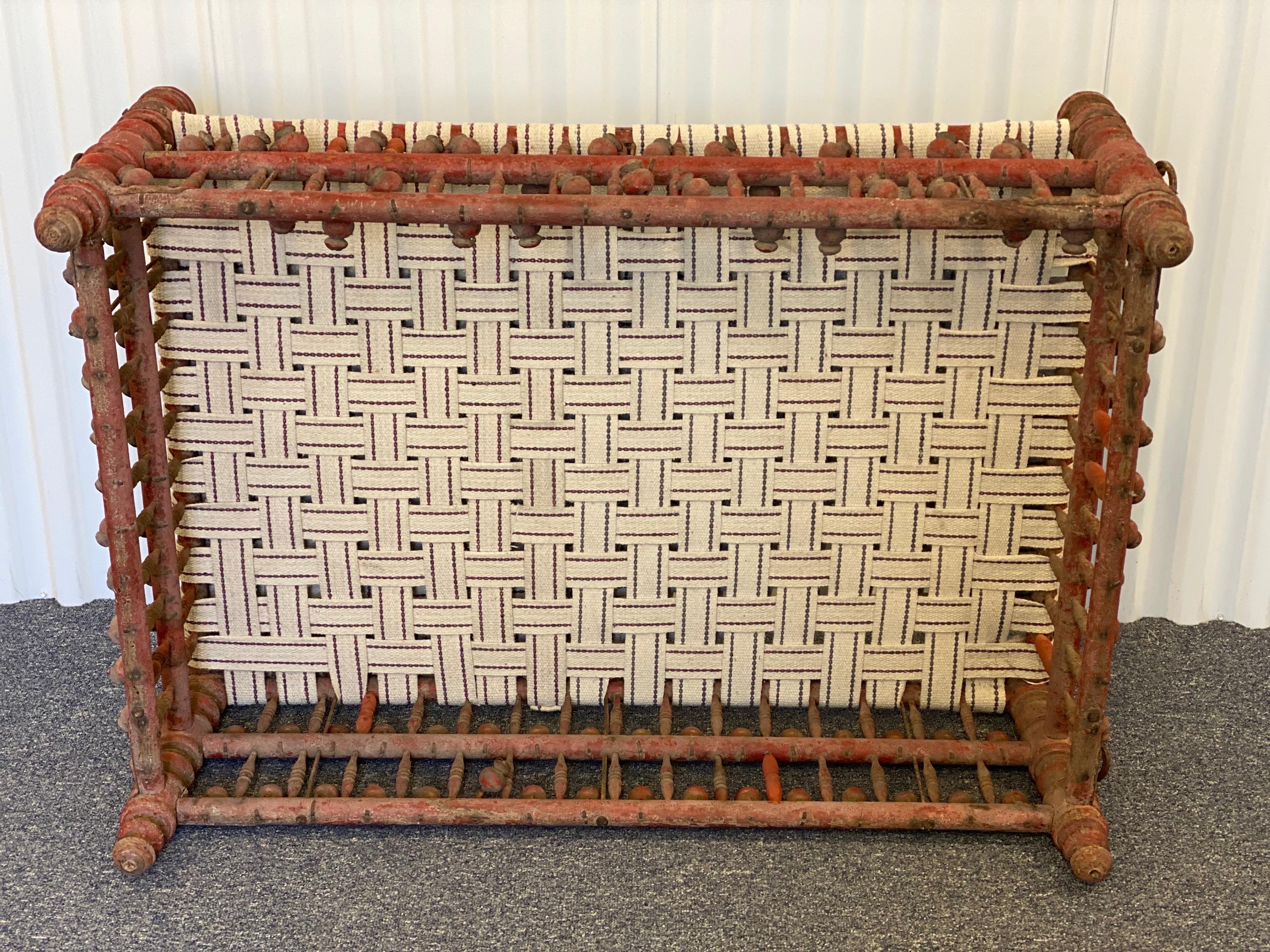 20th Century Indian Red Painted Wooden Ball & Stick Ottoman For Sale 6