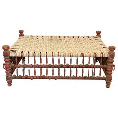 20th Century Indian Red Painted Wooden Ball & Stick Ottoman