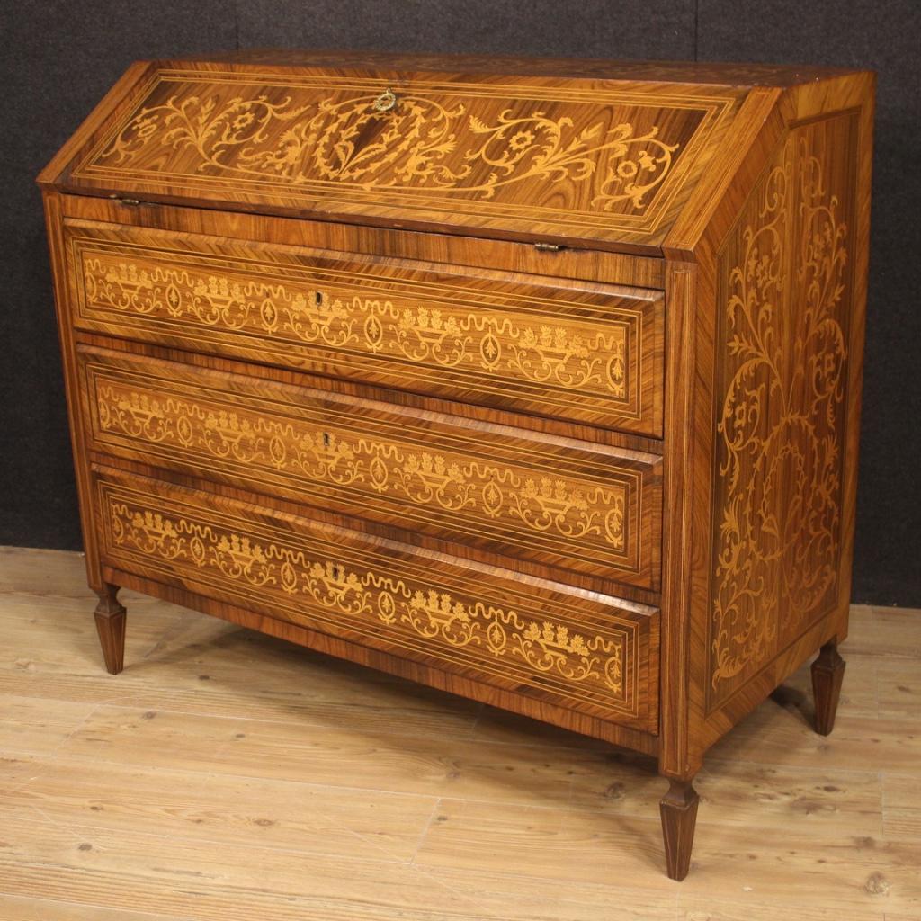 Great Italian bureau from 20th century. Inlaid furniture in walnut, maple, cherry, exotic wood and fruitwood, of fabulous decor. Impressive size Louis XVI style bureau fitted with three large external drawers and fall-front. Interior of the