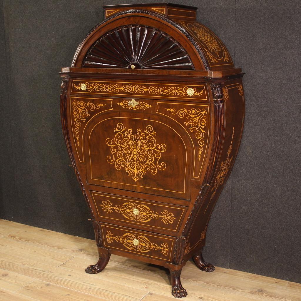 Austrian secretaire from the 20th century. Biedermeier style furniture elegantly inlaid, veneered and carved in walnut, maple, beech and fruitwood. Secretaire built in a single body, moved on the sides, equipped with two drawers in the lower part,