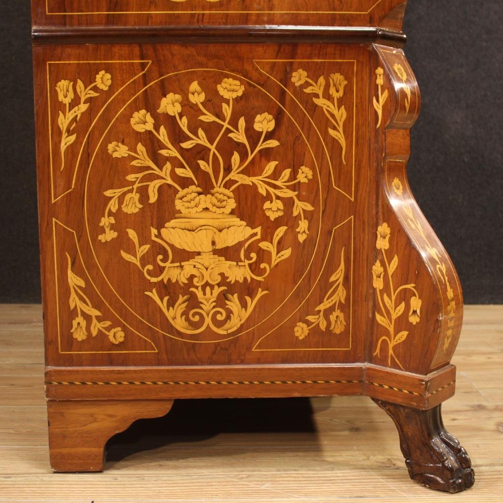 Fabulous 20th century Dutch trumeau. Moved and rounded furniture richly inlaid in walnut, mahogany, beech, maple and fruitwood. Double body trumeau equipped with three external drawers of good capacity. Bureau that offers a good-sized inlaid writing