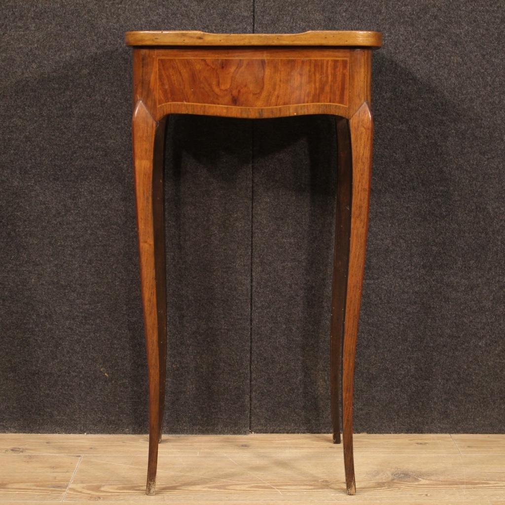French side table from the early 20th century. Furniture inlaid in palisander, walnut, mahogany, maple and beech of beautiful lines and pleasant decor. Side table with wooden top that can be opened that offers two small drawers and a built-in mirror