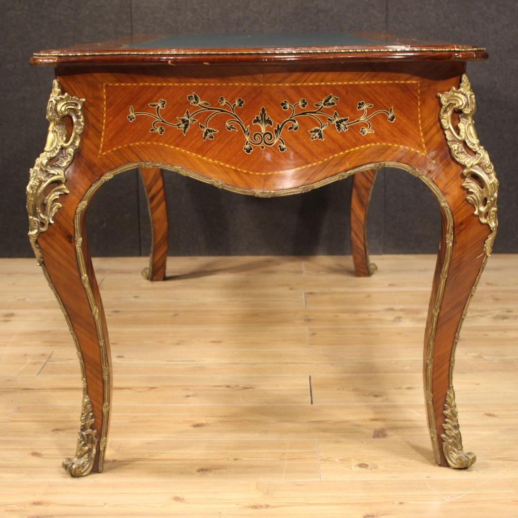 Italian writing desk from 20th century. Napoleon III style furniture inlaid and veneered in walnut, mahogany, maple and fruitwood enriched by fake inlay with hand-painted floral decorations on the edge of the top, front and sides (see photo).