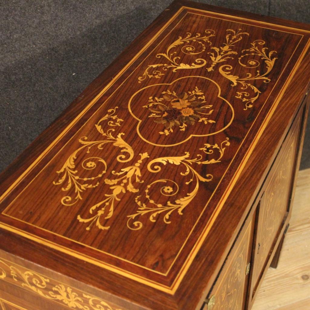 Italian sideboard from 20th century. Louis XVI style furniture inlaid in walnut, palisander, cherry, maple and fruitwood. Small sideboard with two doors and a drawer of discrete capacity and service. Interior of the cabinet complete with a shelf