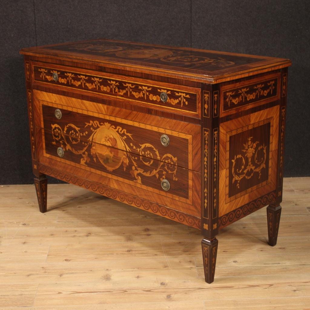 Italian dresser from the second half of the 20th century. Louis XVI style furniture richly inlaid in wood of palisander, rosewood, walnut, maple, tulipwood, ebonized wood and fruitwood. Dresser with three drawers of excellent capacity and service,