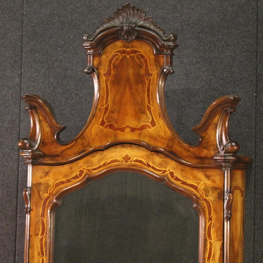 Lombard trumeau from the mid-20th century. Moved and rounded furniture in Rococo style richly inlaid in walnut, burl, maple, beech and fruitwood. Double body trumeau equipped with three large drawers and fall-front in the lower part. Interior also
