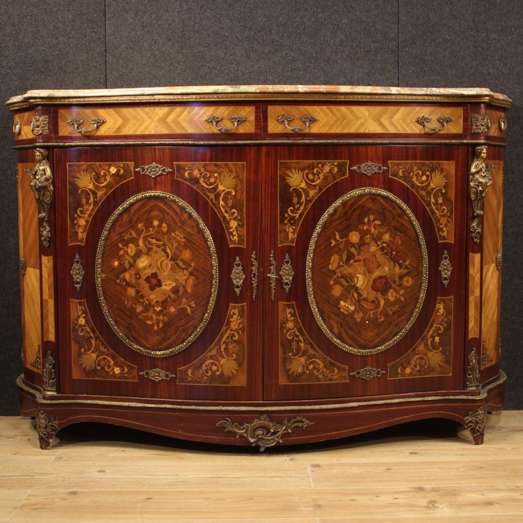 French sideboard from 20th century. Furniture in Napoleon III style richly inlaid and adorned with decorations in gilded and chiseled bronze and brass (see photo). Inlaid sideboard in mahogany, rosewood, maple, walnut burl and fruitwood with floral