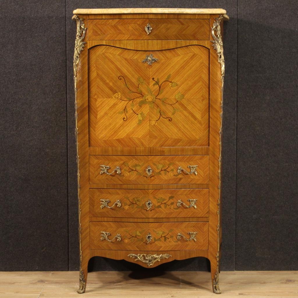 French secretaire from the second half of the 20th century. Furniture veneered and inlaid with rosewood, maple, palisander, mahogany and fruitwood. Secretaire adorned with gilded and chiseled bronze (see photo) and floral inlay on the front. Moved