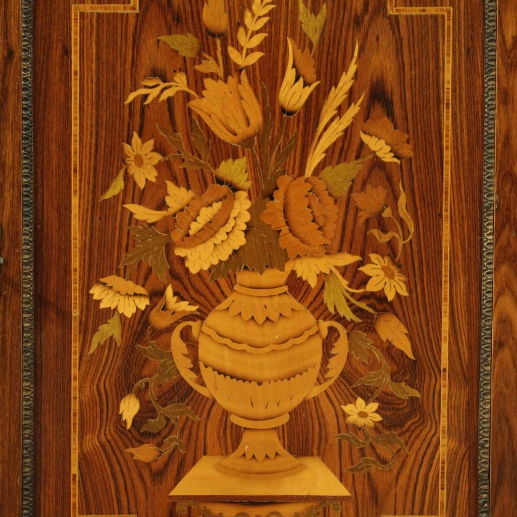 French sideboard of the 20th century. Furniture pleasantly inlaid in walnut, rosewood, maple, beech and fruitwood. Cabinet richly adorned with gilded and chiseled bronze and brass (see photo). Furniture with three doors, two of which are lateral