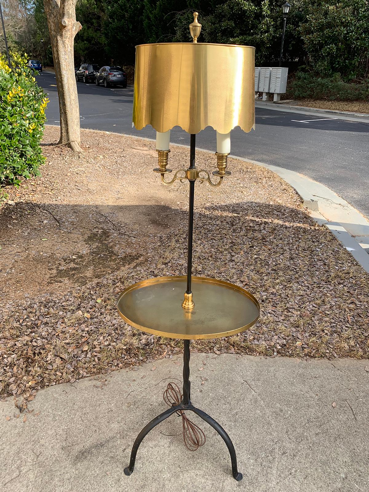 20th century iron floor lamp with brass table, adjustable brass shade.
Brand new wiring
Measures: 17