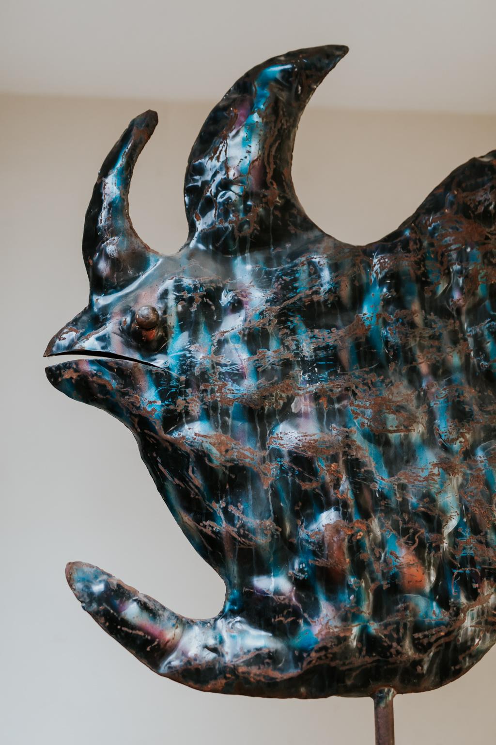 Great patination on this fish sculpture, mounted on iron base, found in Spain.