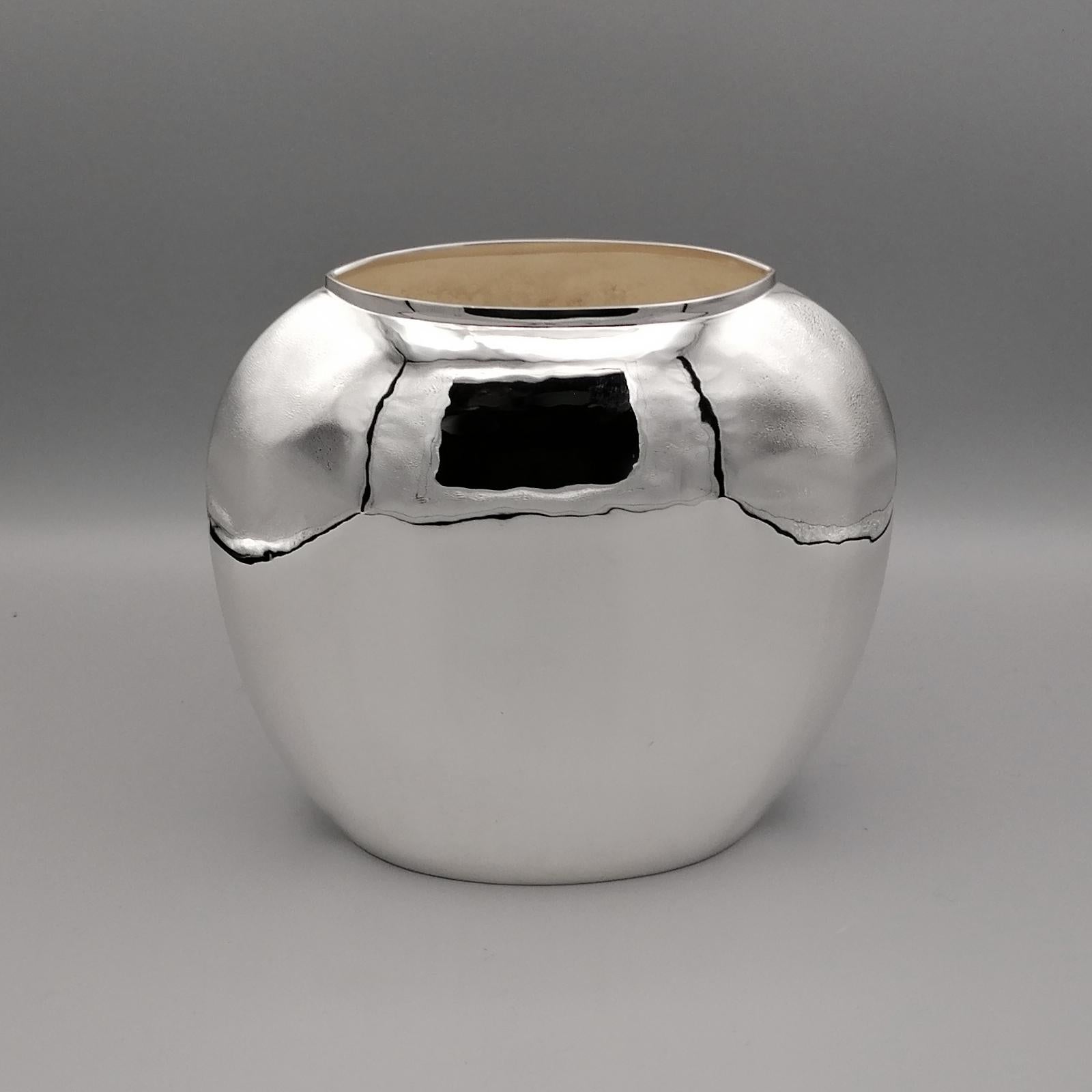 Semi-round and flattened 800 solid silver vase.
The vase was completely handmade in Milan - Italy - by the silversmith 