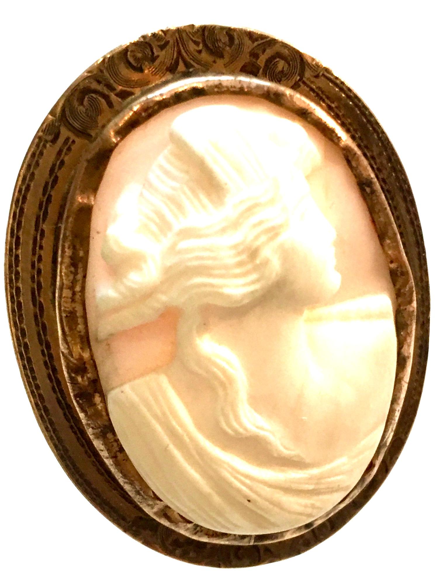 20th Century Antique Italian 12K Gold & Highly Carved Pink Shell Cameo Brooch. Feature a pink shell highly carved with incredible detail right facing female Cameo.