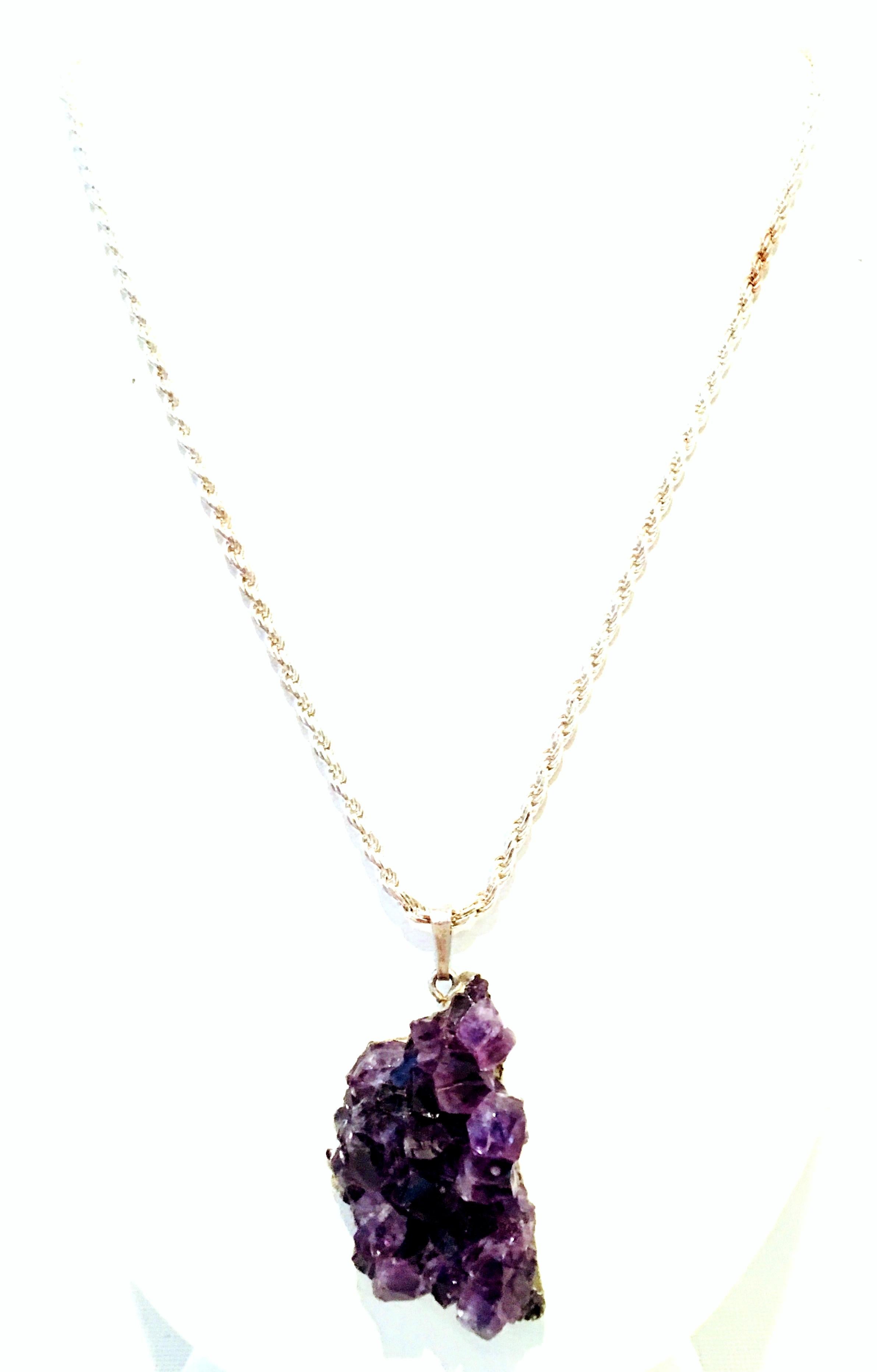 20th Century Italian 925 Sterling Silver & Natural Amethyst Geode Pendant Necklace. This signed Italian 925 Sterling Silver chain link necklace features a natural fine quality sterling silver set Amethyst Geode Crystal Pendant. The Geode itself