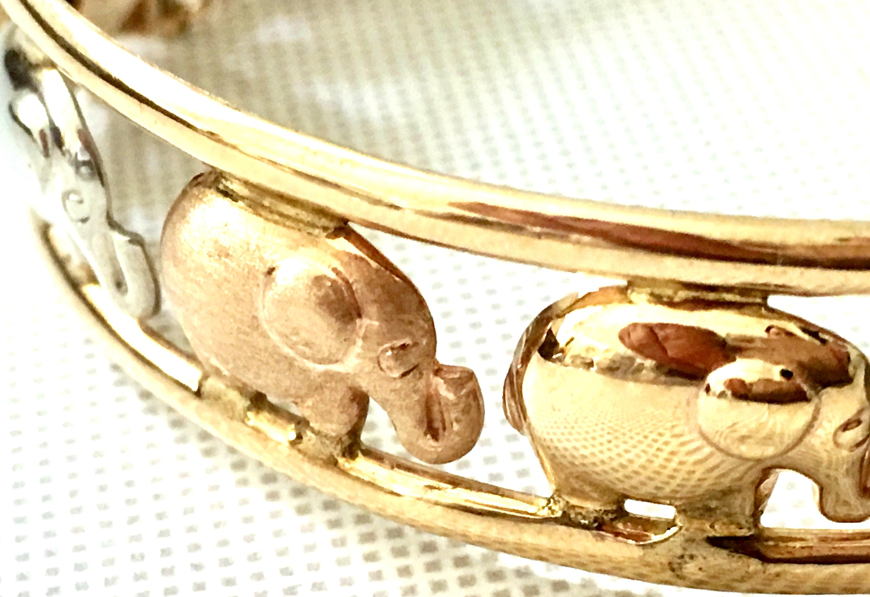 Women's or Men's 20th Century Italian 9K Rose, Yellow & White Gold Elephant Bangle Bracelet