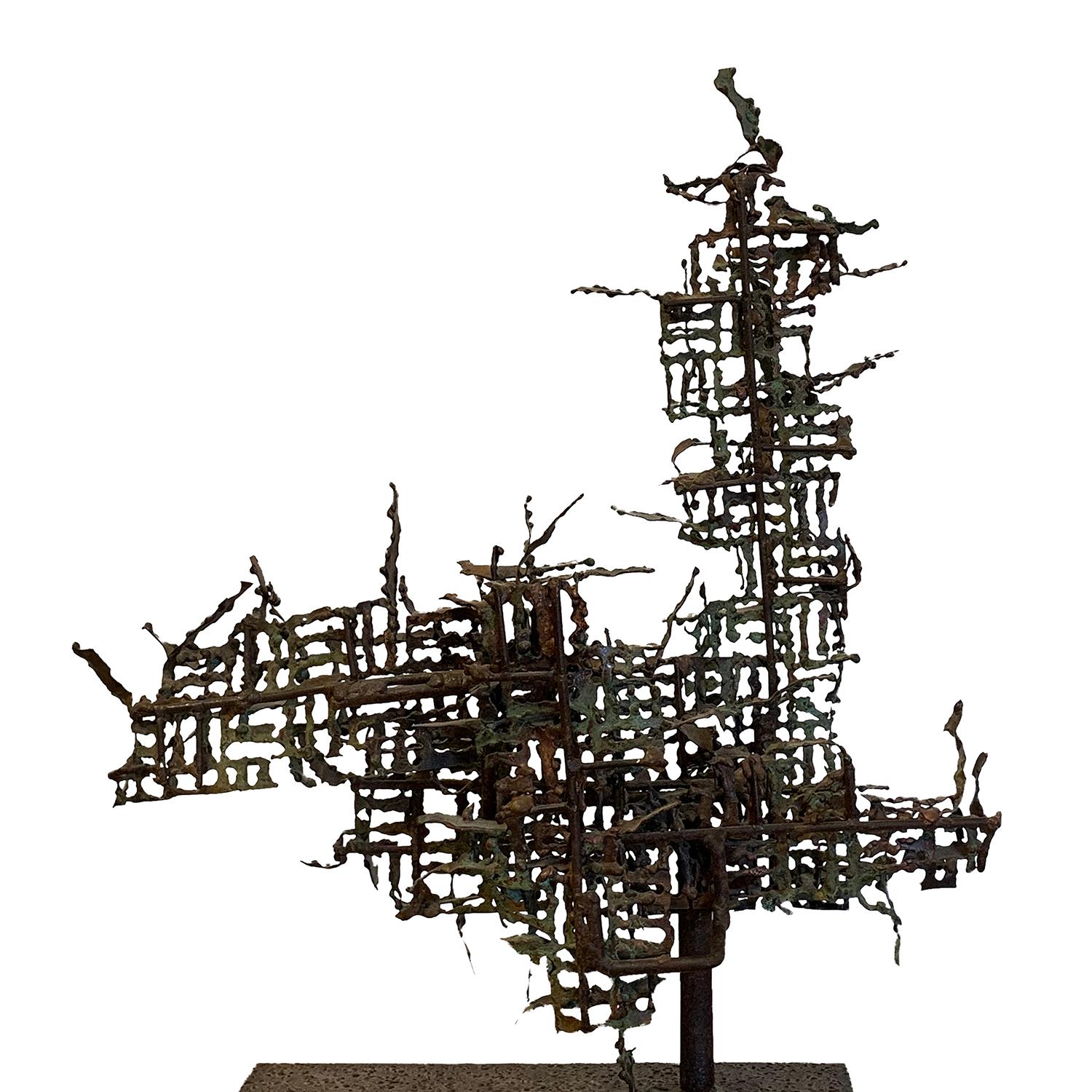 A vintage Mid-Century Modern Italian Brutalist abstract sculpture made of metal, welded and signed by Marcello Fantoni, in good condition. Wear consistent with age and use, circa 1950, Italy.

Marcello Fantoni was an Italian designer and producer