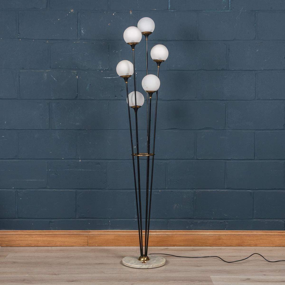 An excellent example of the “Alberello” floor lamp produced by Stilnovo, Milan, Italy. This lamp was produced in the 1960's and does not show its age at all both in terms of looks and condition. Often these lamps are seen with coloured diffusers but