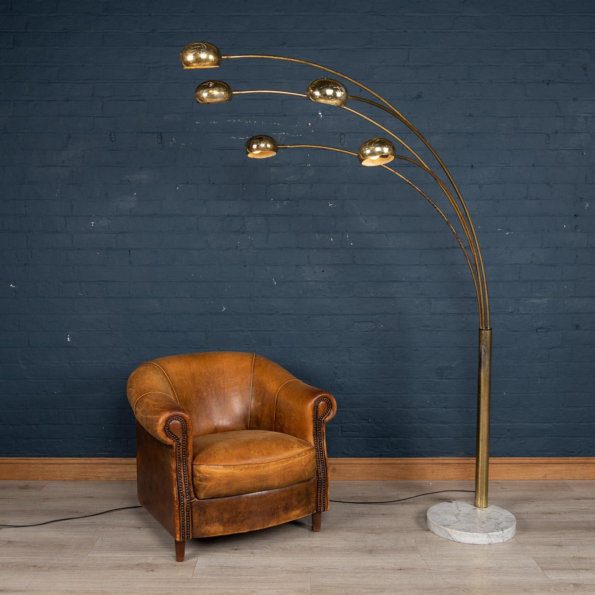 Chic Italian 1960s-1970s Harvy Guzzini arc floor lamp with five swivel arms and ball shades. Brass shades are adjustable, arms can be adjusted horizontally about 180 degrees. Supported by original thick marble base. Original wiring and in working