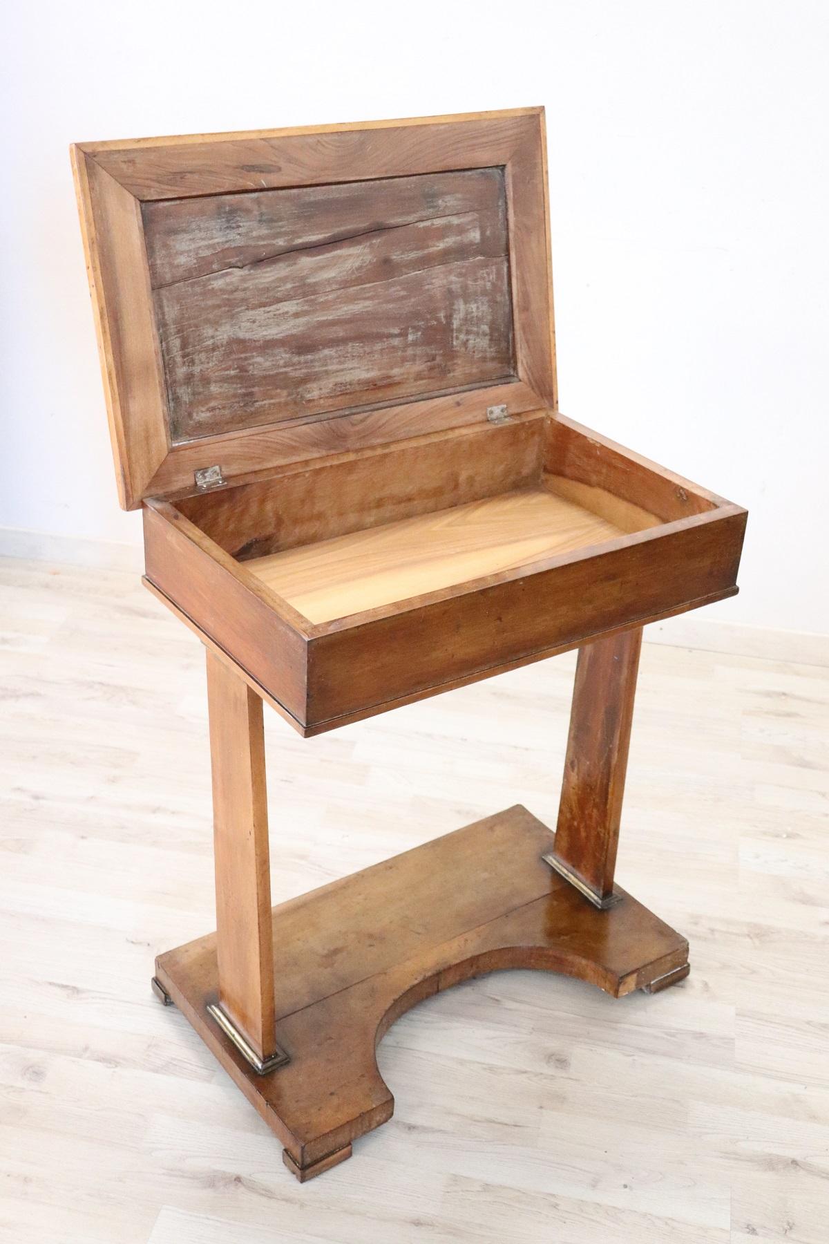 Fine quality Italian Art Deco 1940s side table. Made with precious briar root walnut. The top opens and internally has a very useful compartment. The side table have been used need of restoration as you can see from the wear defects in photos. We