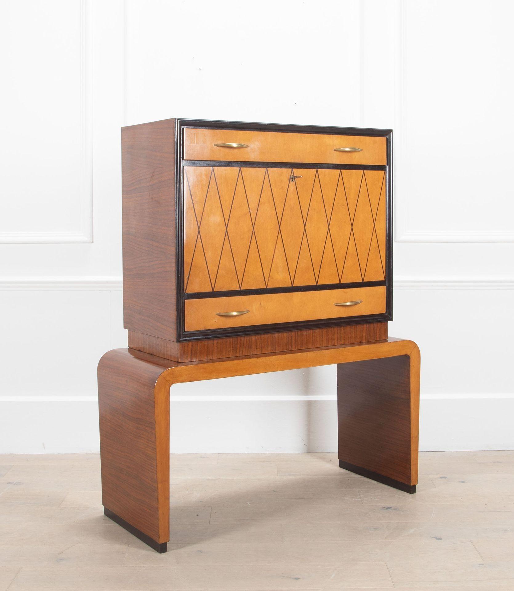 20th Century Italian, late Art Deco drinks cabinet.
Smart and stylish drinks cabinet on stand; in sycamore and rosewood veneers.
Circa 1940.