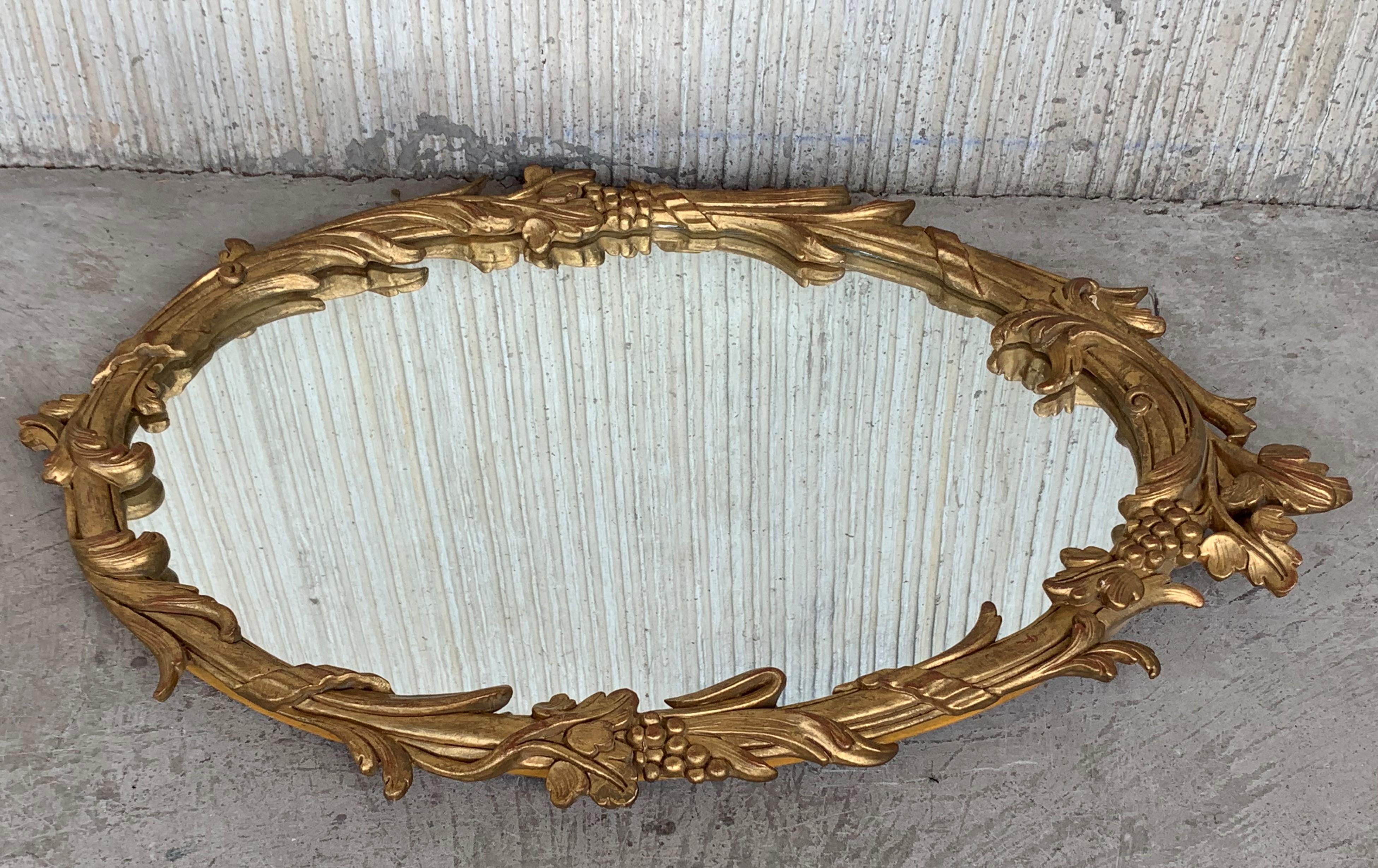 20th Century Italian Art Deco Wall Mirror in a Foliate Giltwood Frame 1