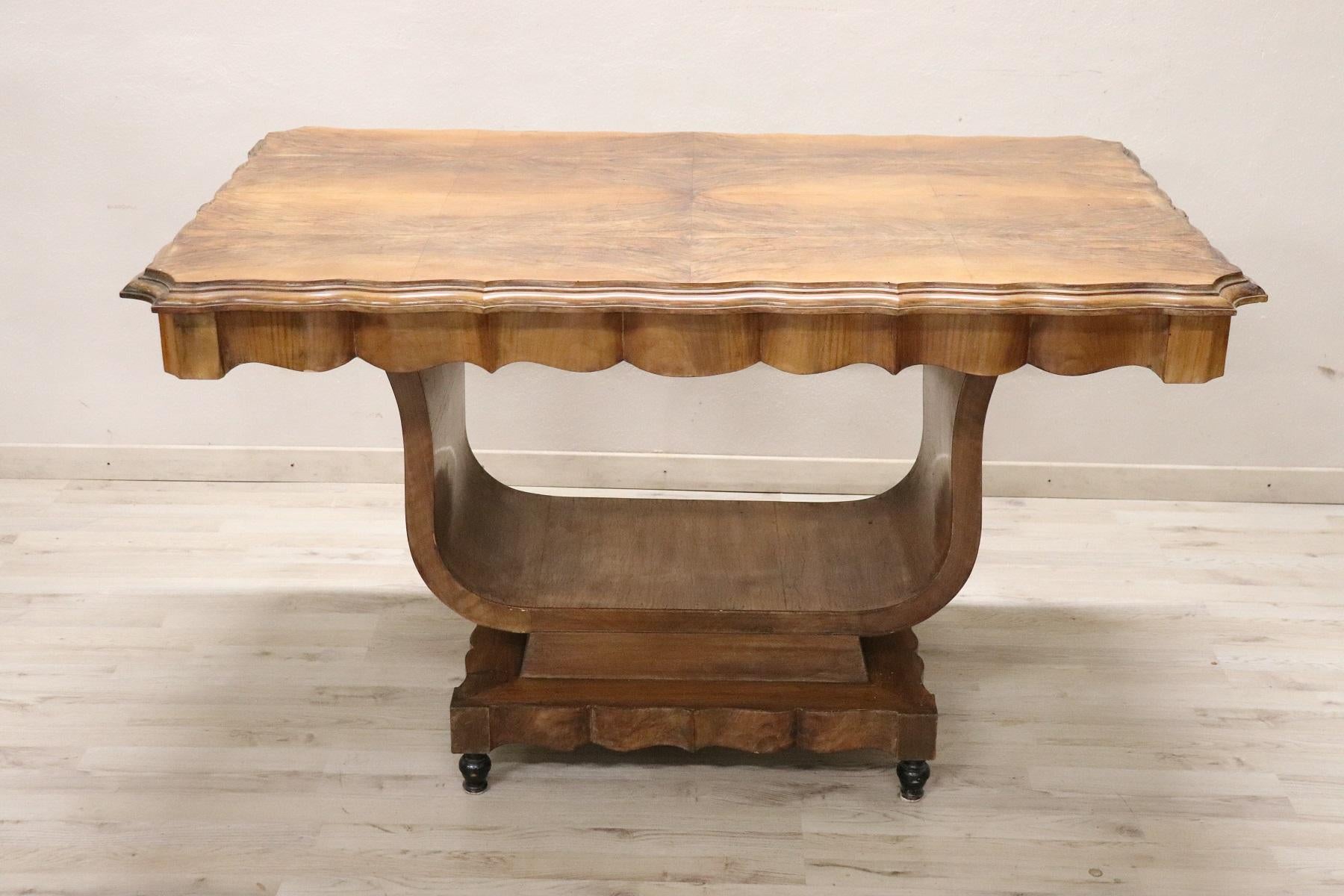 Delicious Italian Art Deco table 1930s. Made of fine walnut burl with. Perfect table for a dining room or to embellish the center of a large hall. Perfect condition ready to be used in your beautiful home.