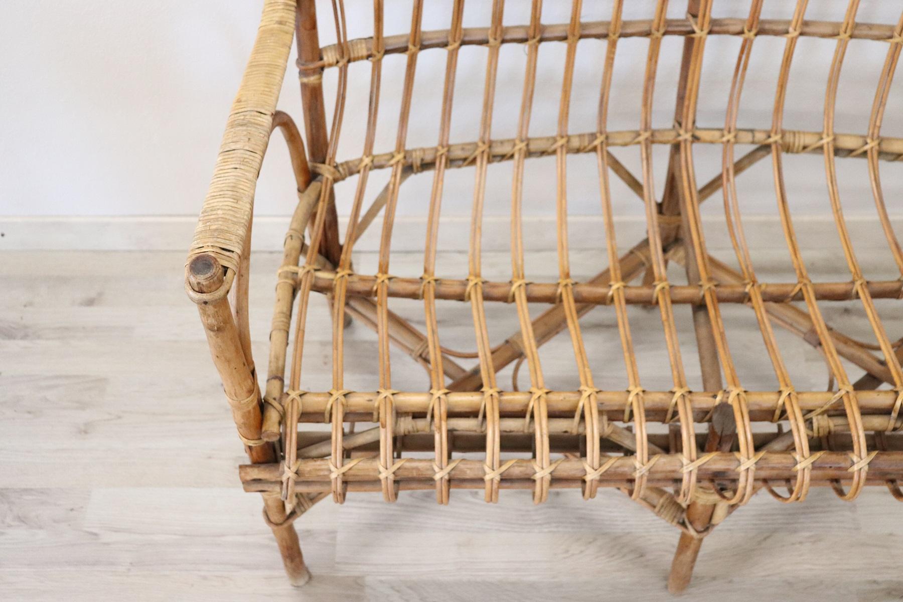 Rare Italian living room set of 4 pieces. The living room was made by Italian artisans around in 1960s. Completely made with bamboo and rattan woven with refined quality. This furniture is perfect for your patio or your garden in summer. The pillows